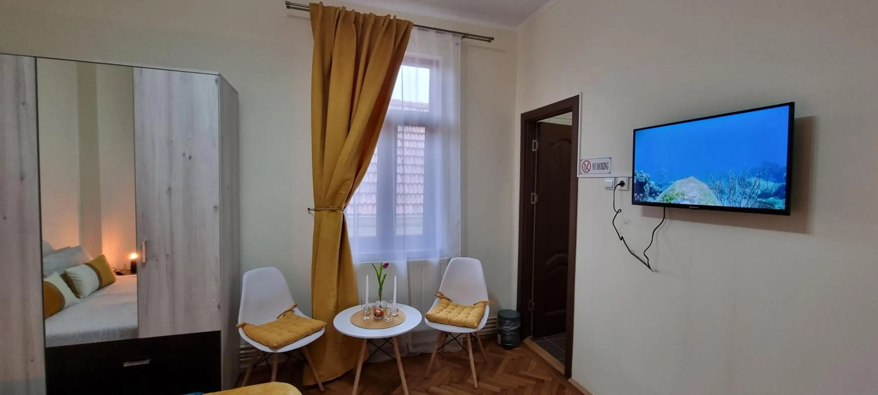 TV and multimedia in Happy Mood Apartments
