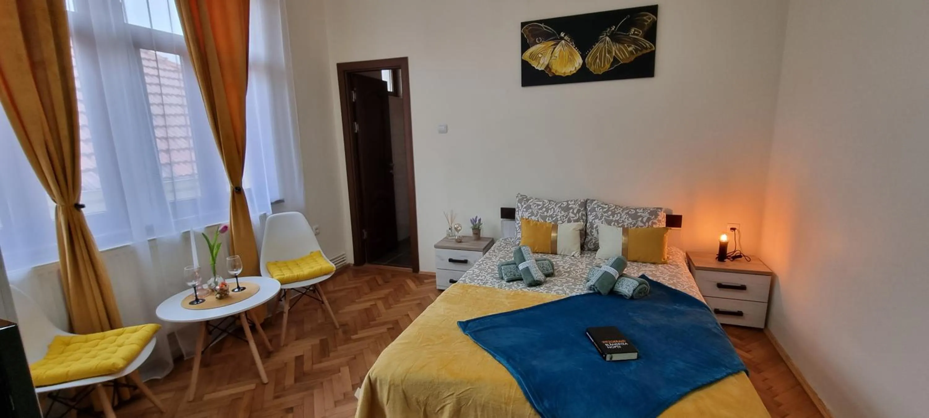 Bed in Happy Mood Apartments
