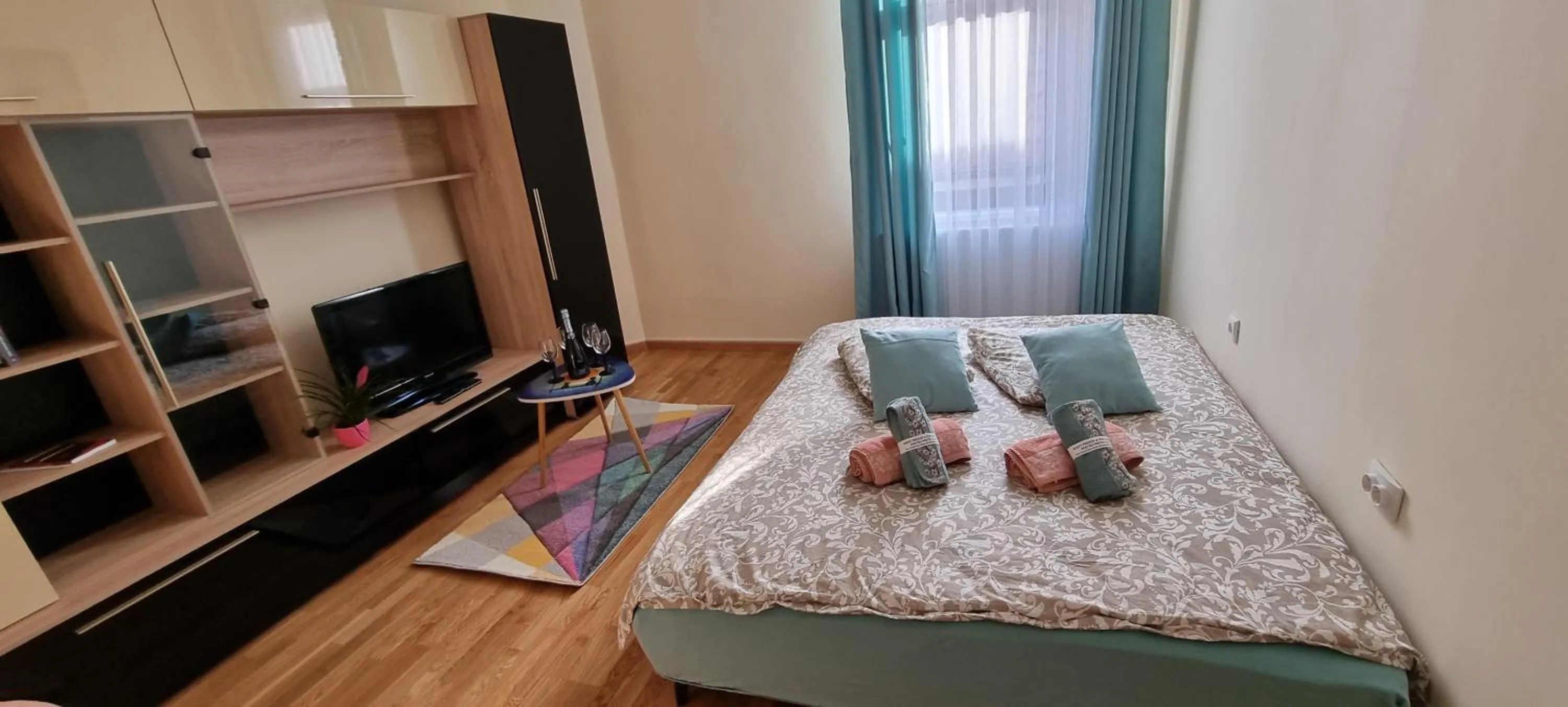 Bed in Happy Mood Apartments