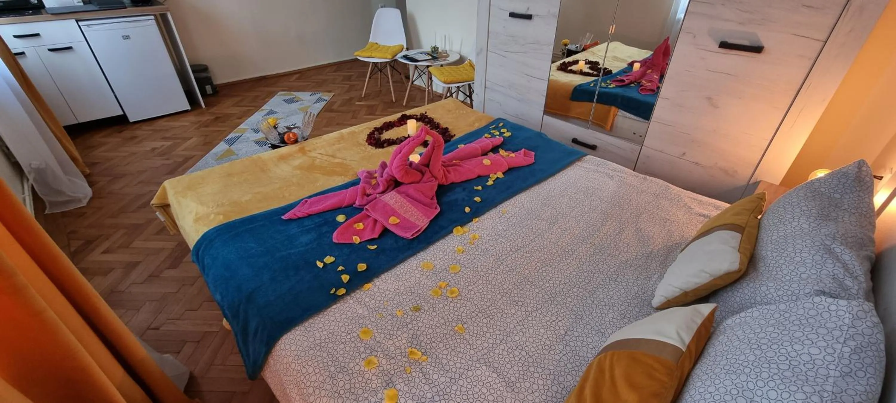 Bed in Happy Mood Apartments