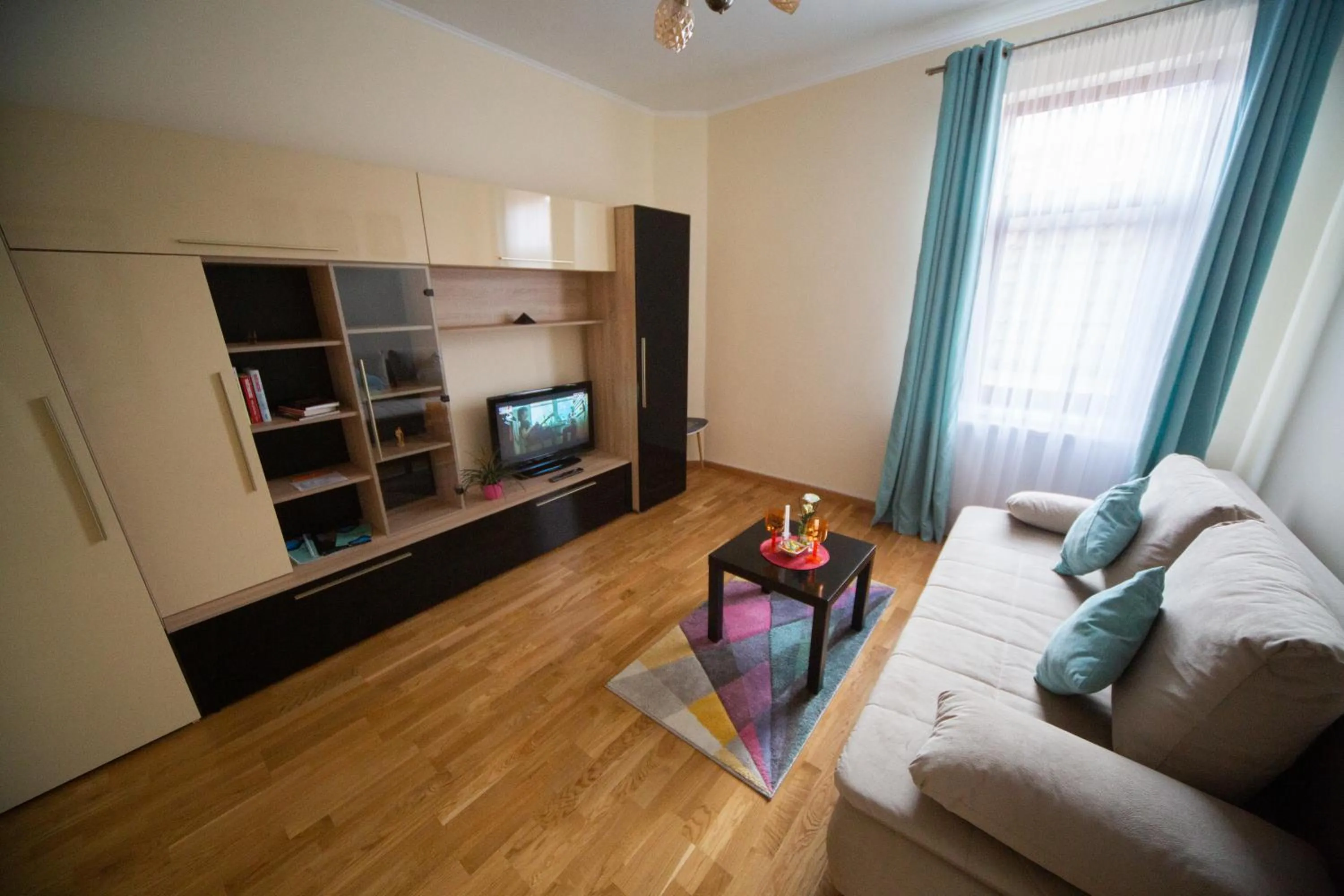 Living room in Happy Mood Apartments