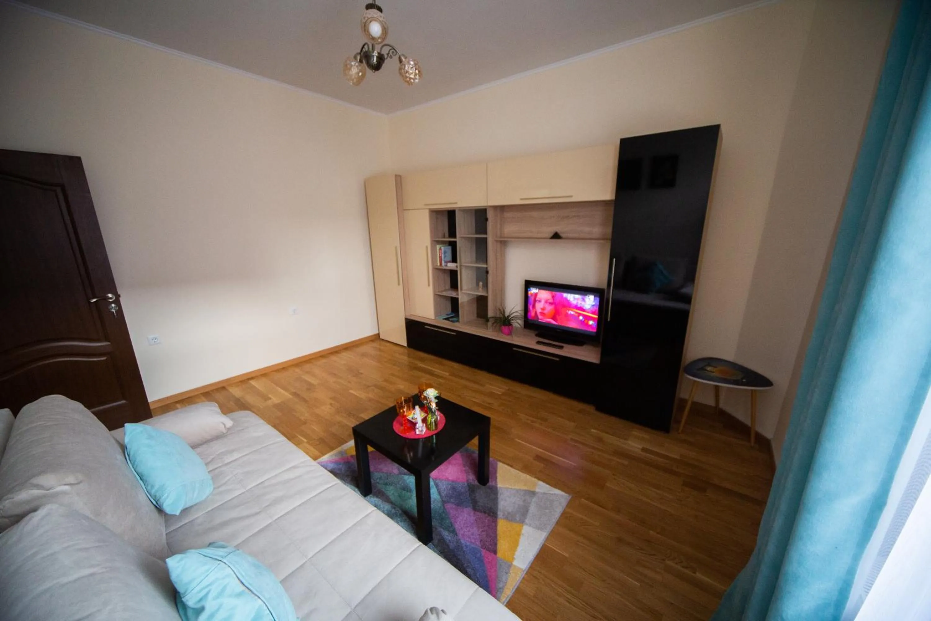 Living room in Happy Mood Apartments