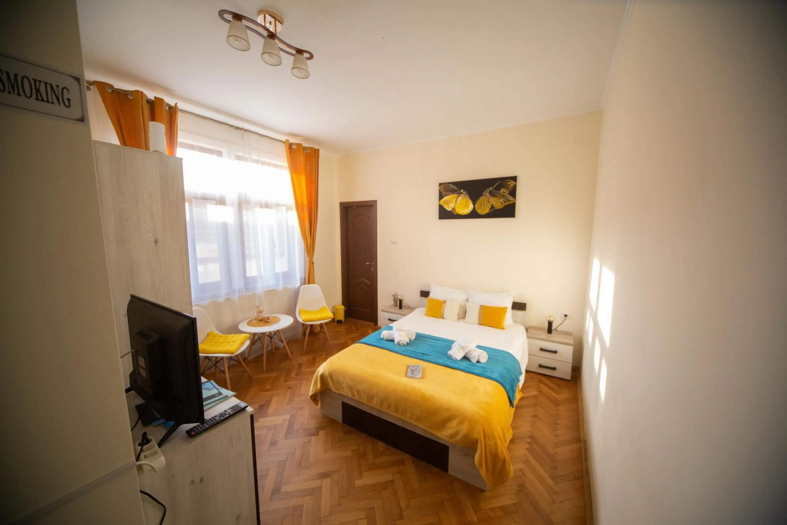 Bed in Happy Mood Apartments