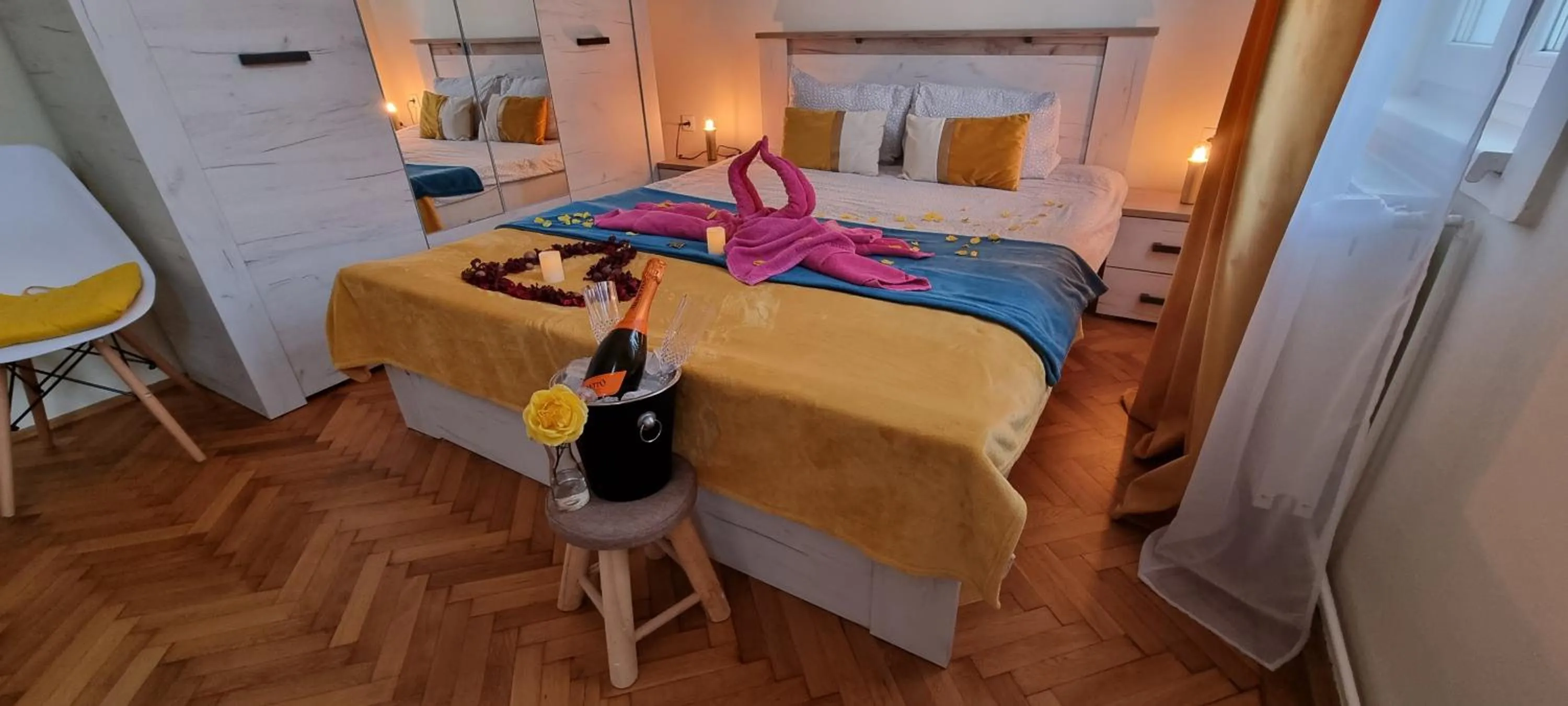 Bed in Happy Mood Apartments