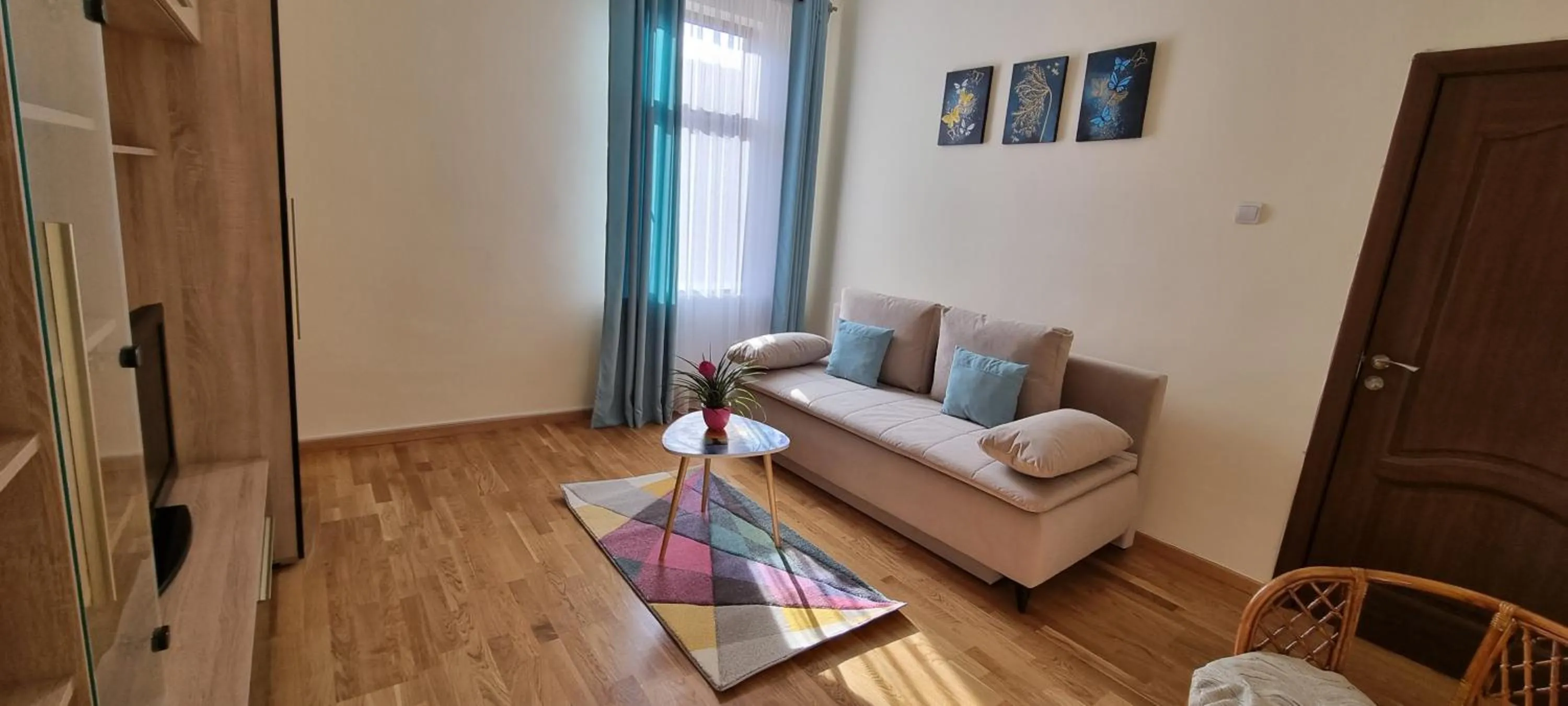 Living room in Happy Mood Apartments