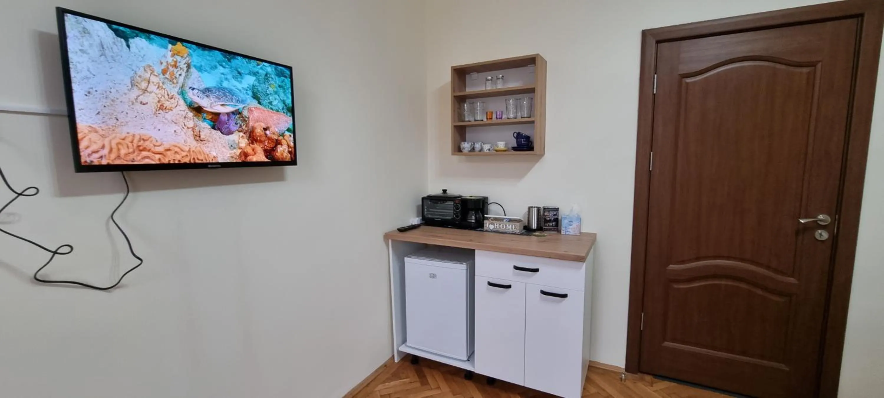 TV and multimedia in Happy Mood Apartments