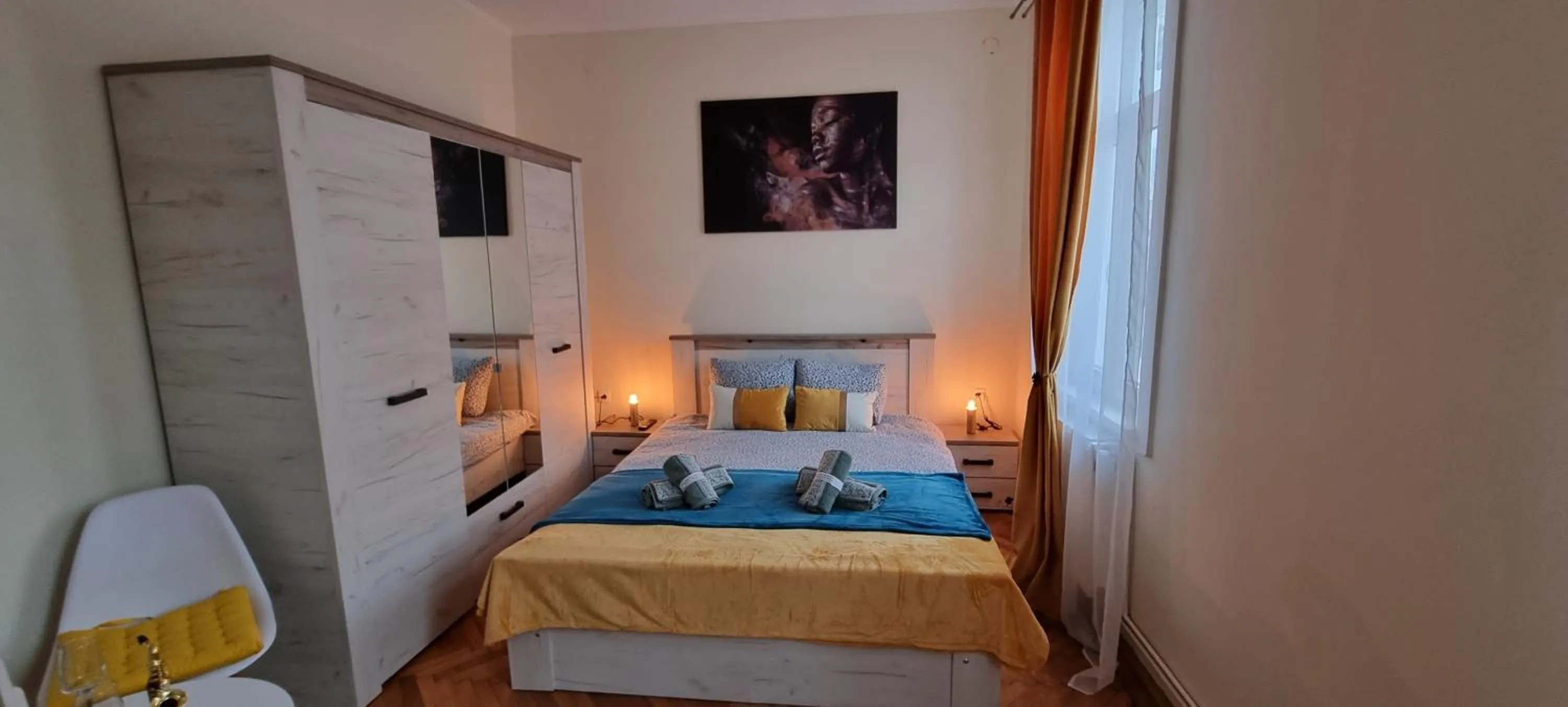Bed in Happy Mood Apartments
