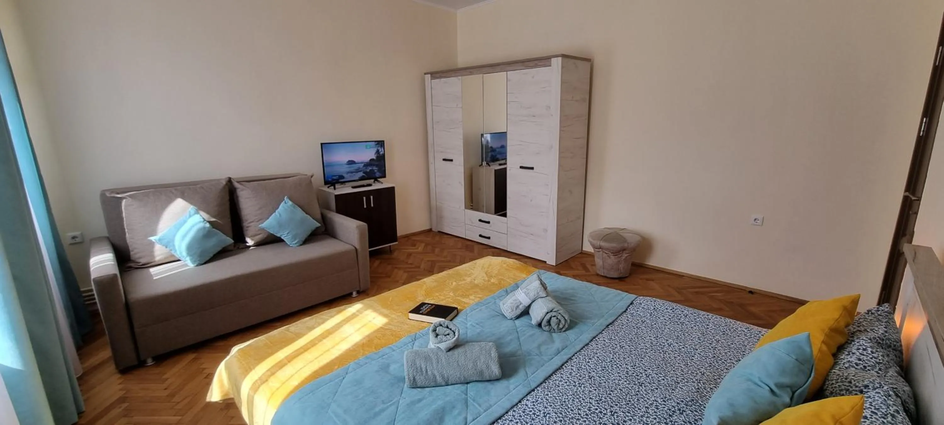 TV and multimedia in Happy Mood Apartments