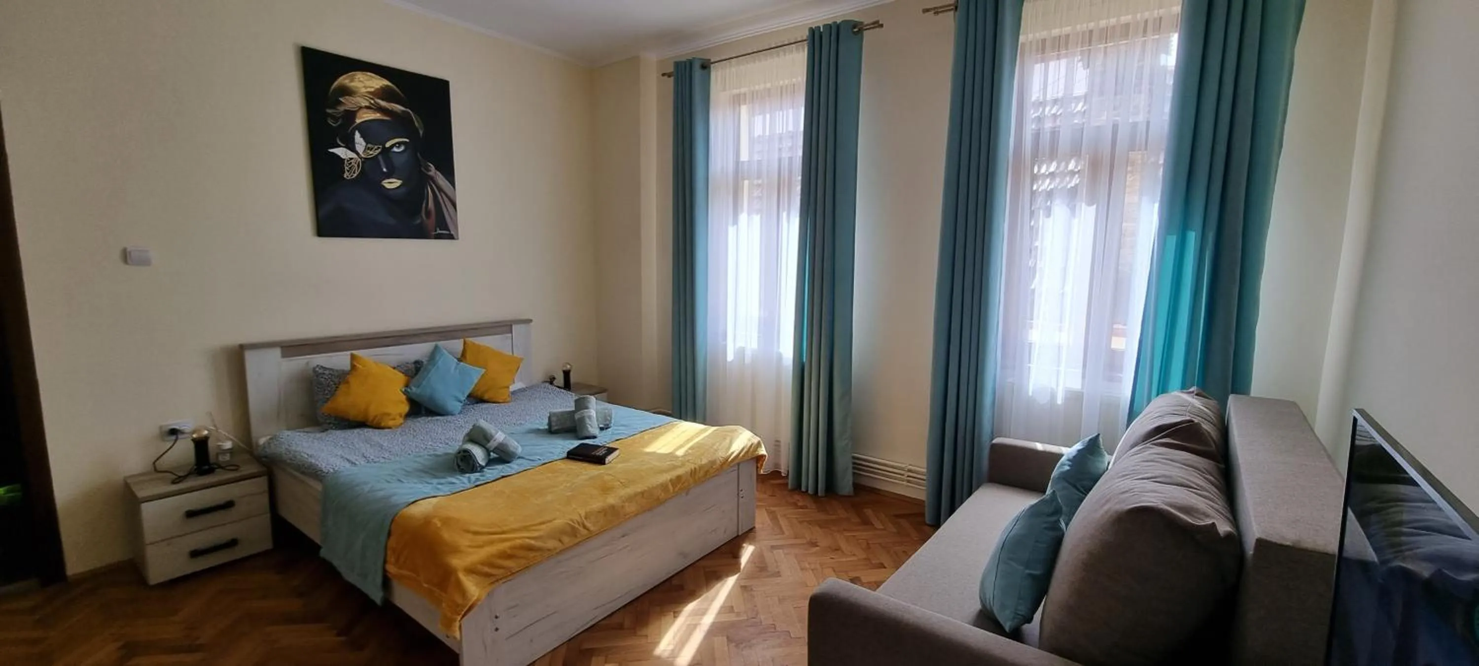 Bed in Happy Mood Apartments