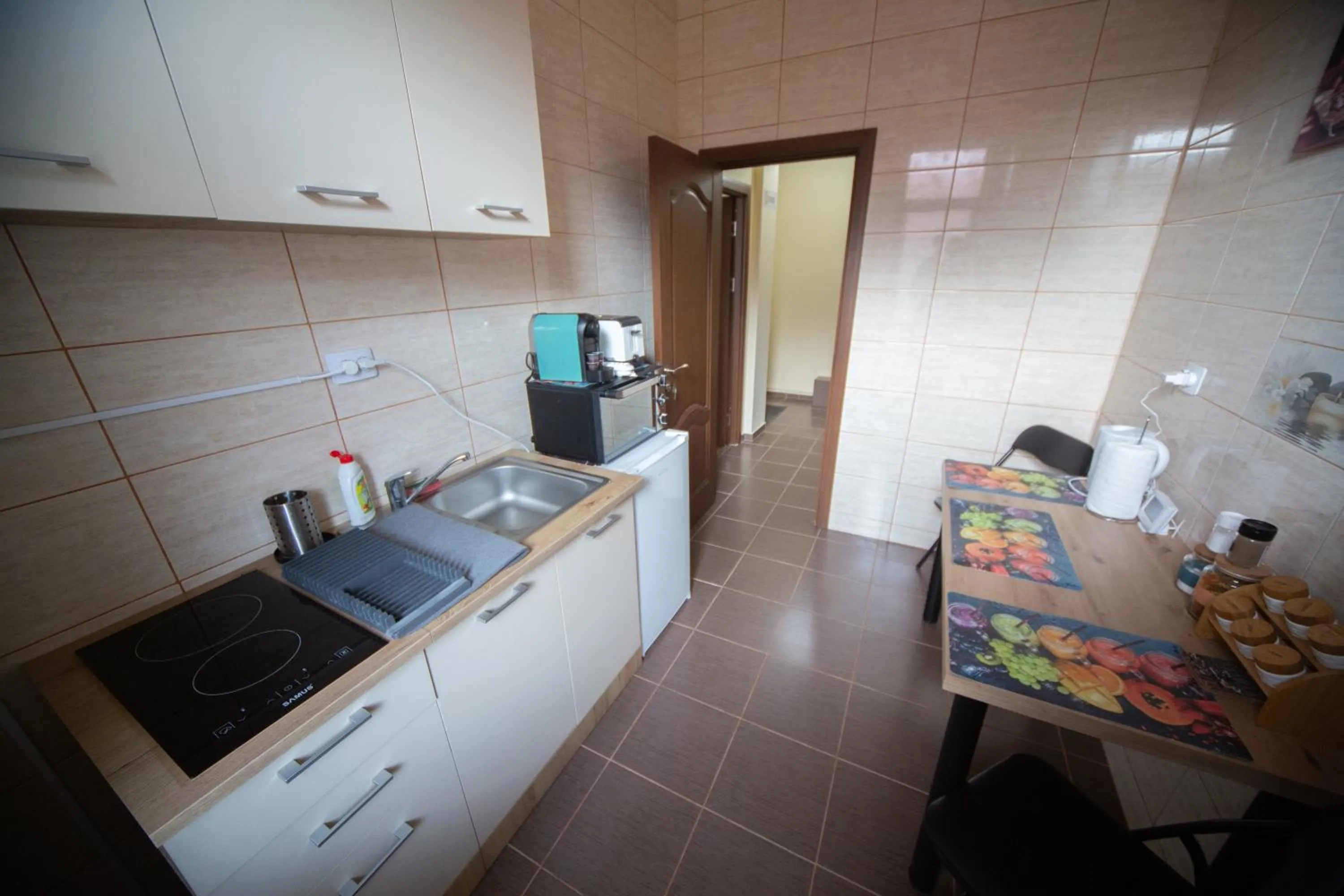 kitchen in Happy Mood Apartments