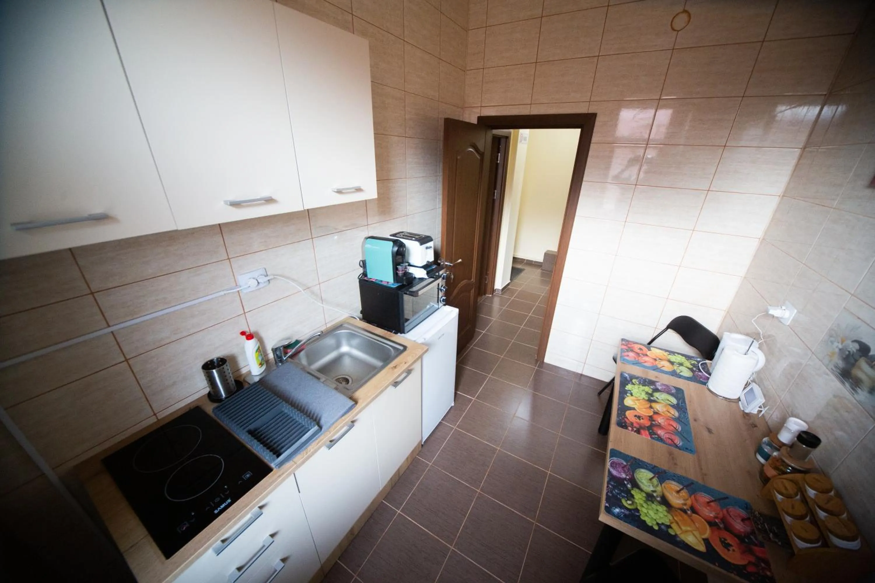 kitchen in Happy Mood Apartments