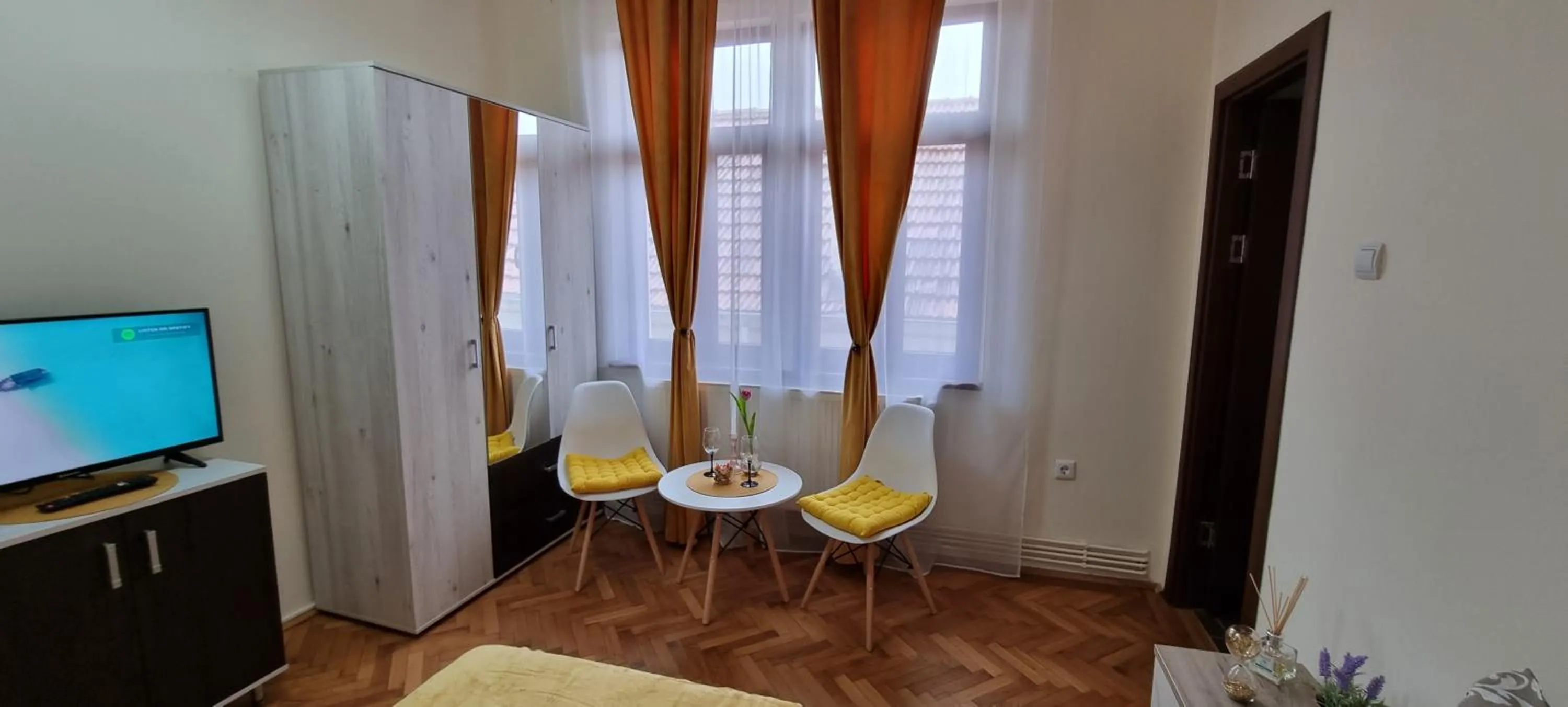 TV and multimedia in Happy Mood Apartments
