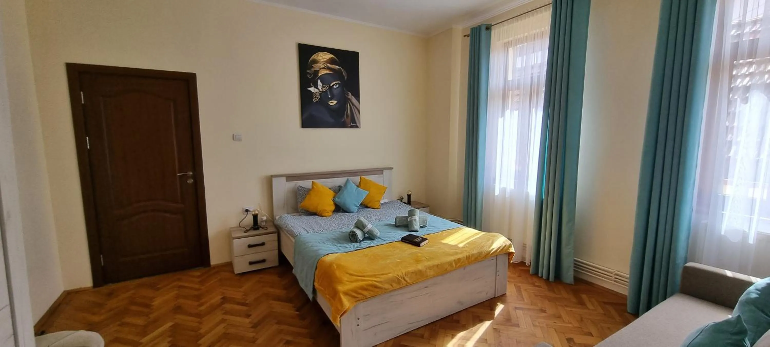 Bed in Happy Mood Apartments