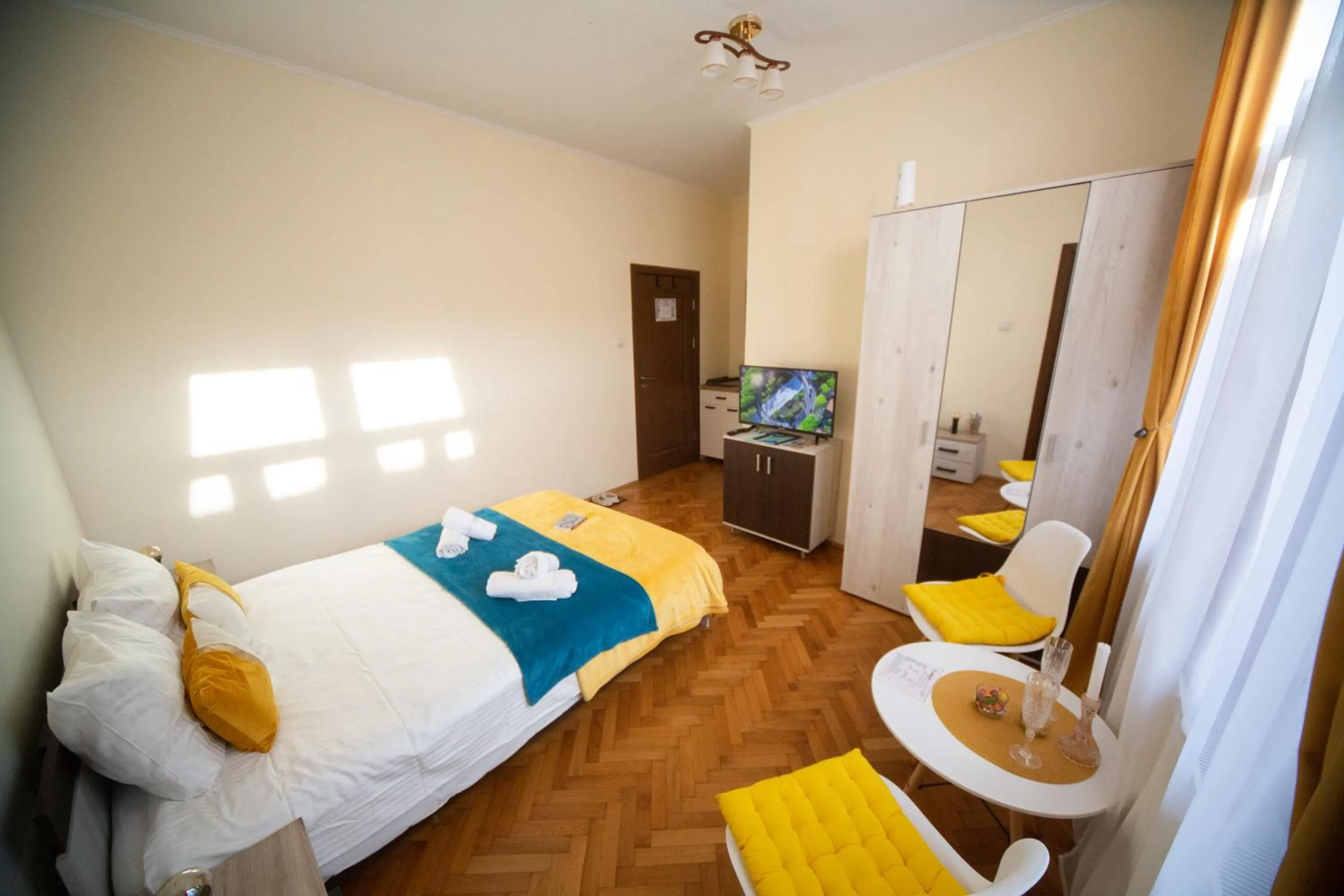Bed in Happy Mood Apartments