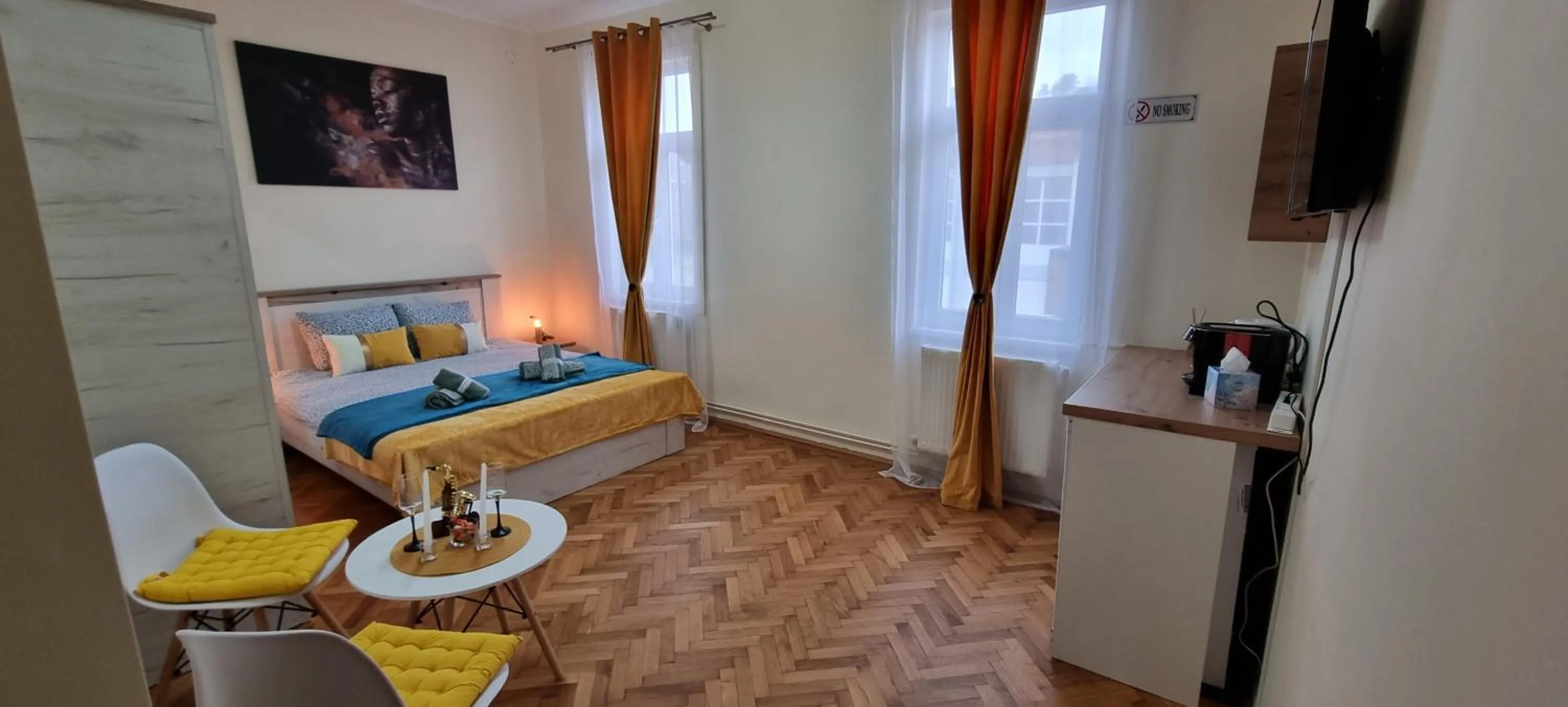 Seating area in Happy Mood Apartments