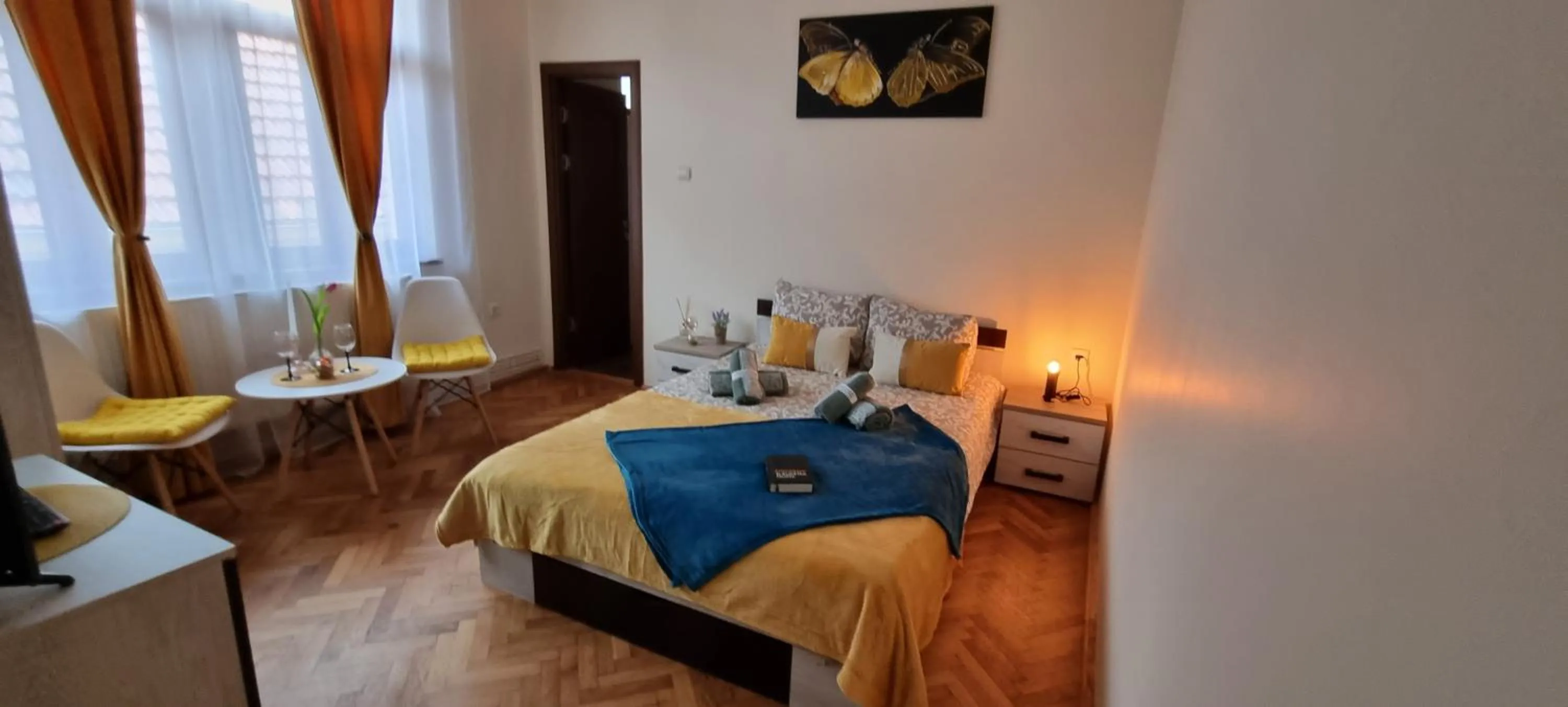 Bed in Happy Mood Apartments