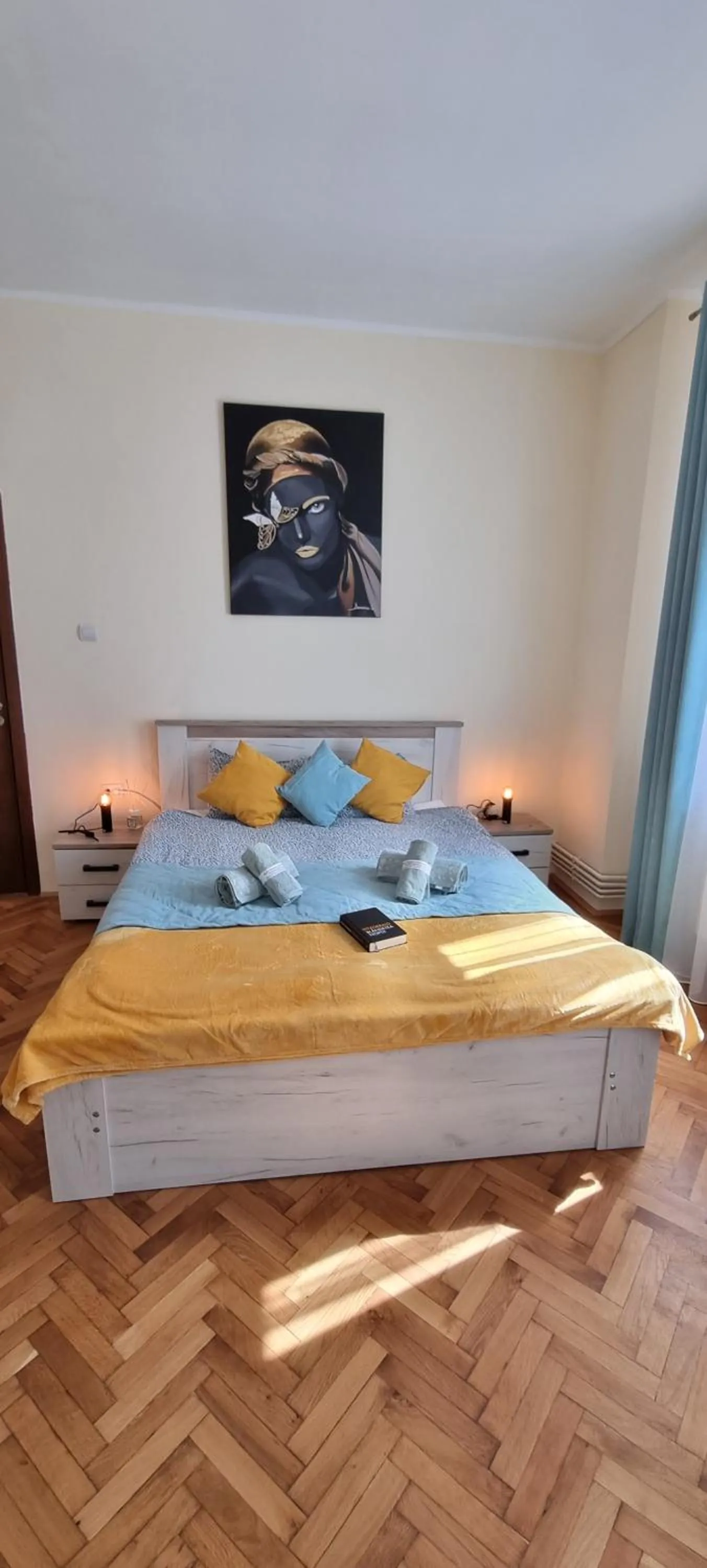 Bed in Happy Mood Apartments