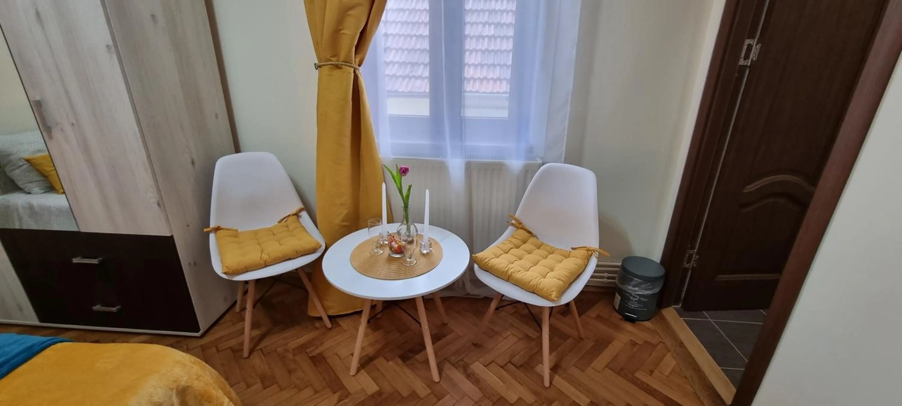 Seating area in Happy Mood Apartments