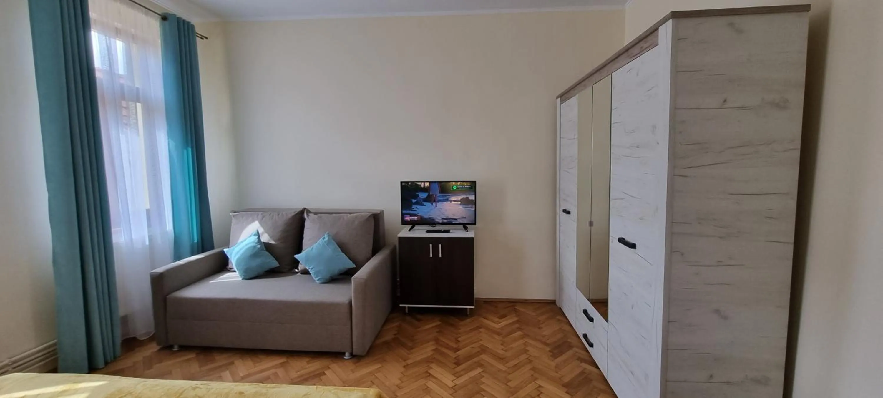 TV and multimedia in Happy Mood Apartments