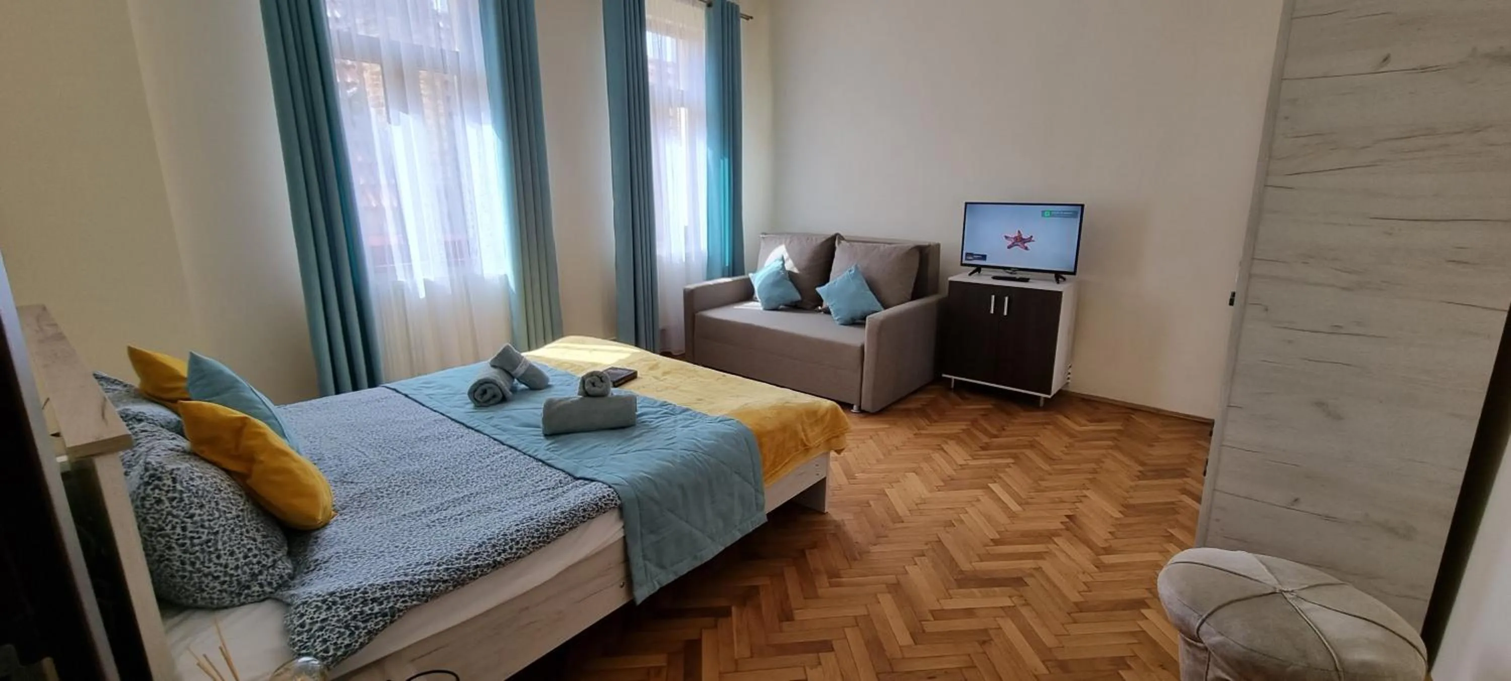 Bed in Happy Mood Apartments