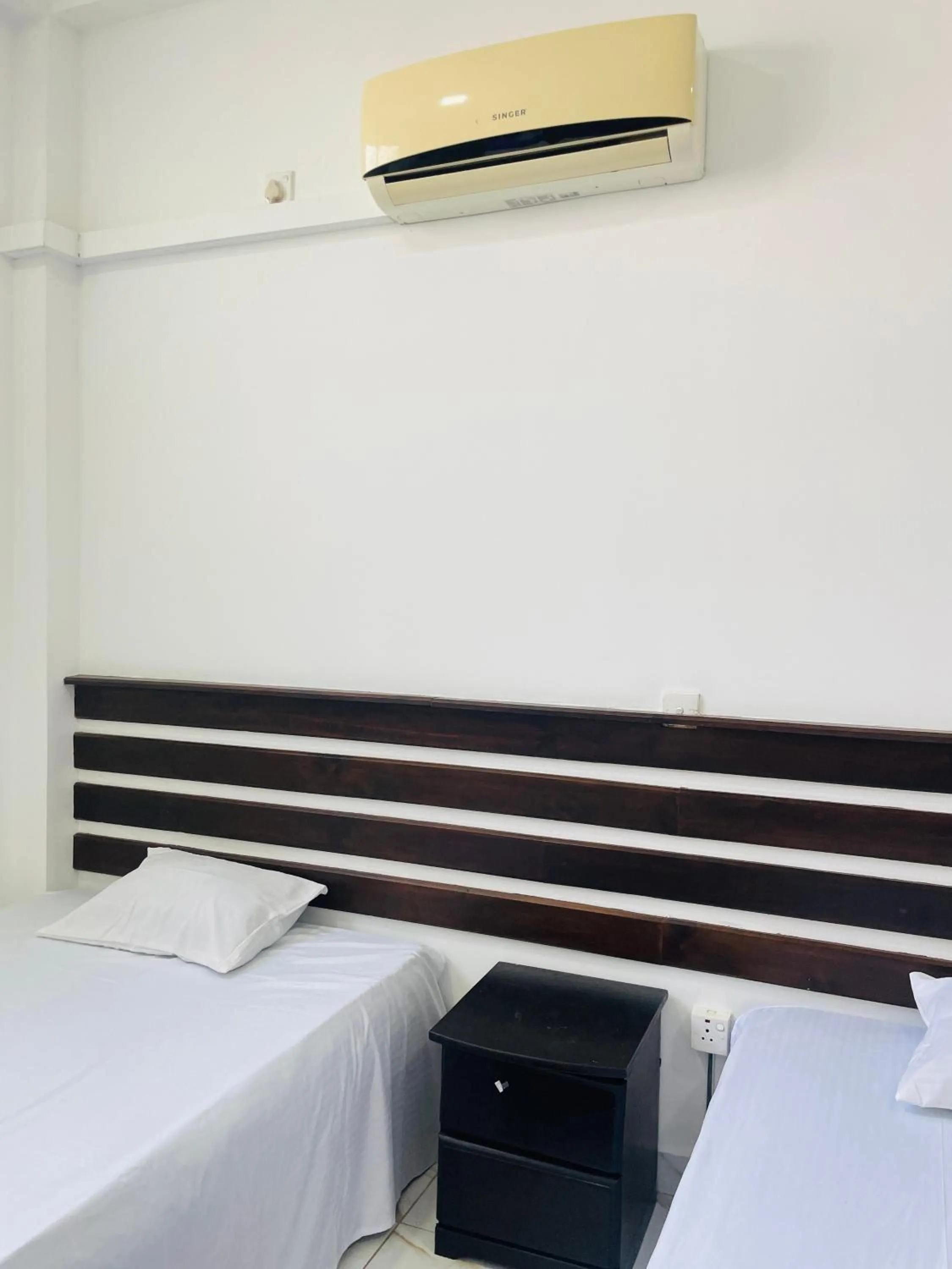 air conditioner, Bed in White House Holiday Resort