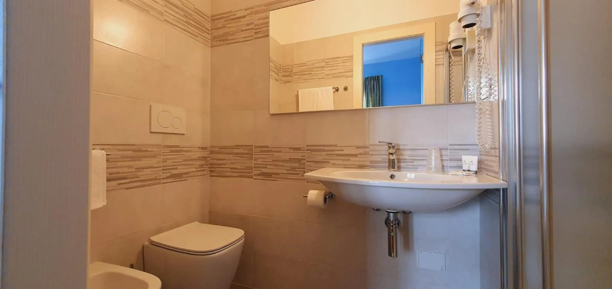 Bathroom in Hotel Sud Est by Fam Rossetti