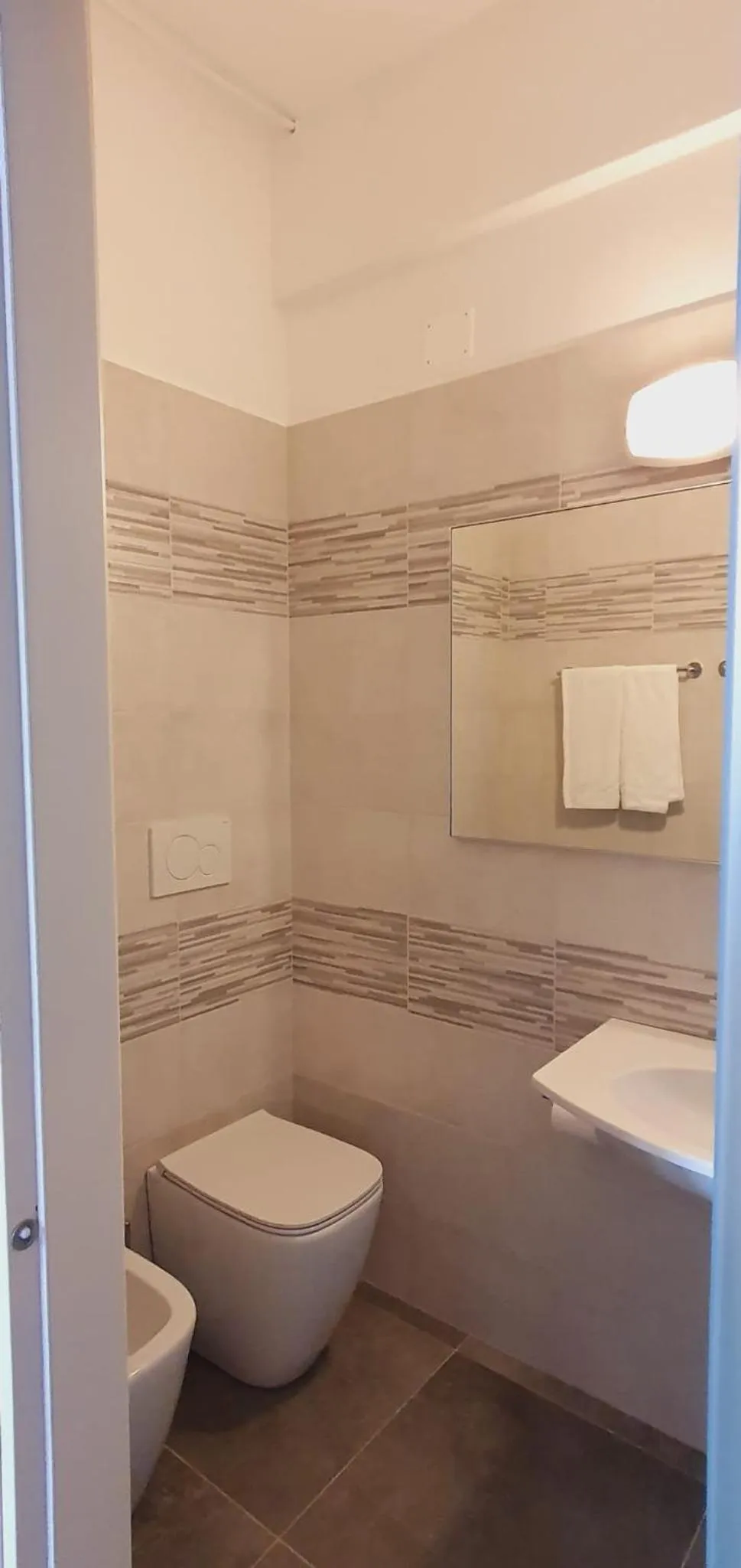 Bathroom in Hotel Sud Est by Fam Rossetti