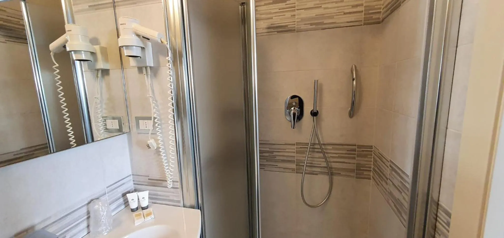 Bathroom in Hotel Sud Est by Fam Rossetti