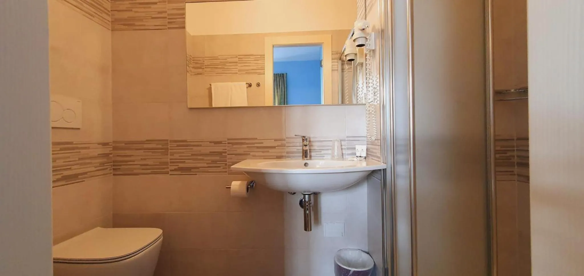 Bathroom in Hotel Sud Est by Fam Rossetti