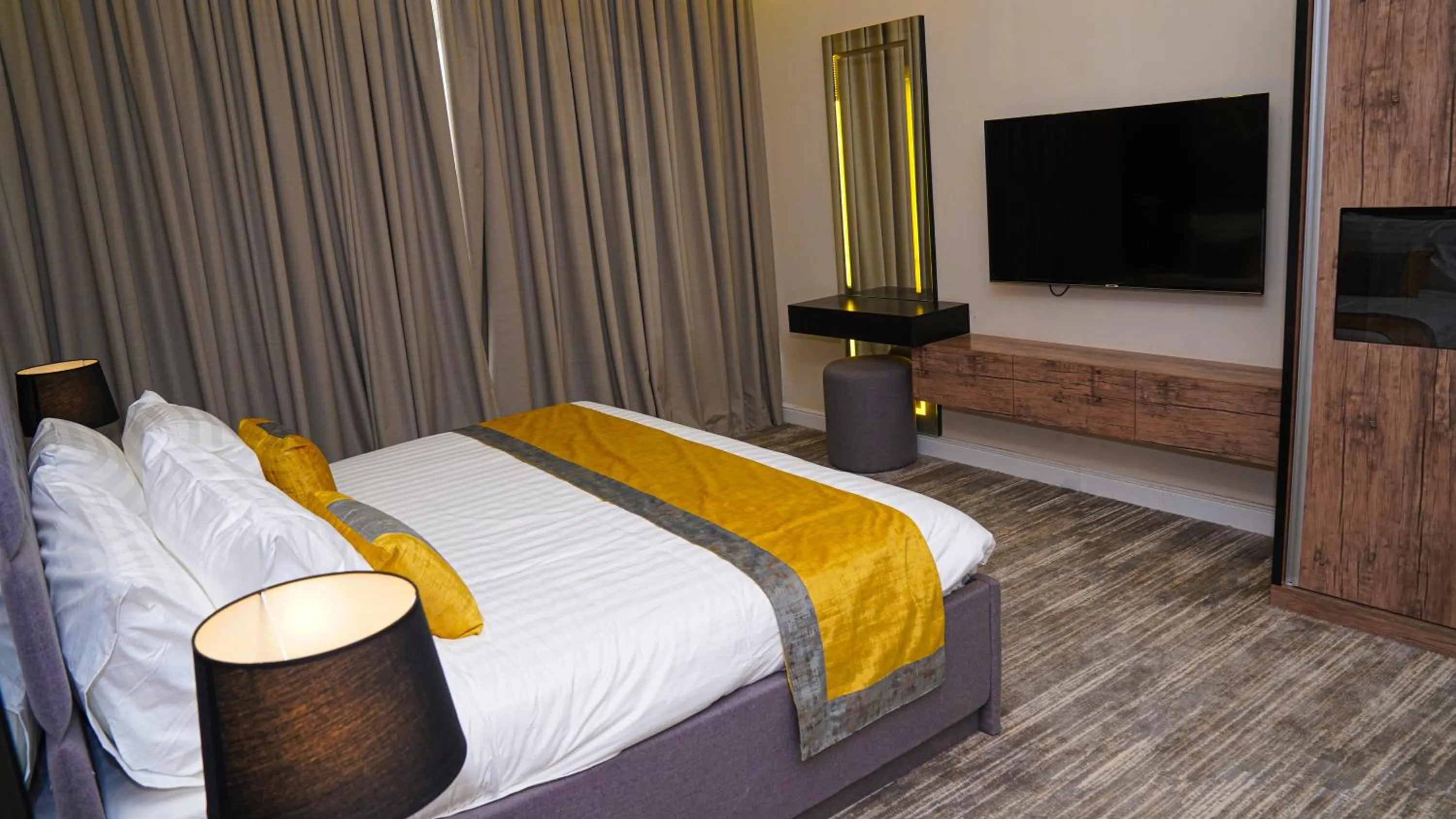 Bed in Clowzer Serviced Apartments