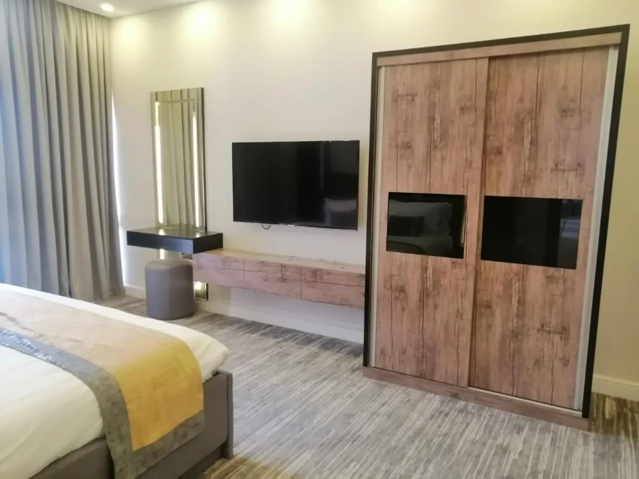 Bed in Clowzer Serviced Apartments