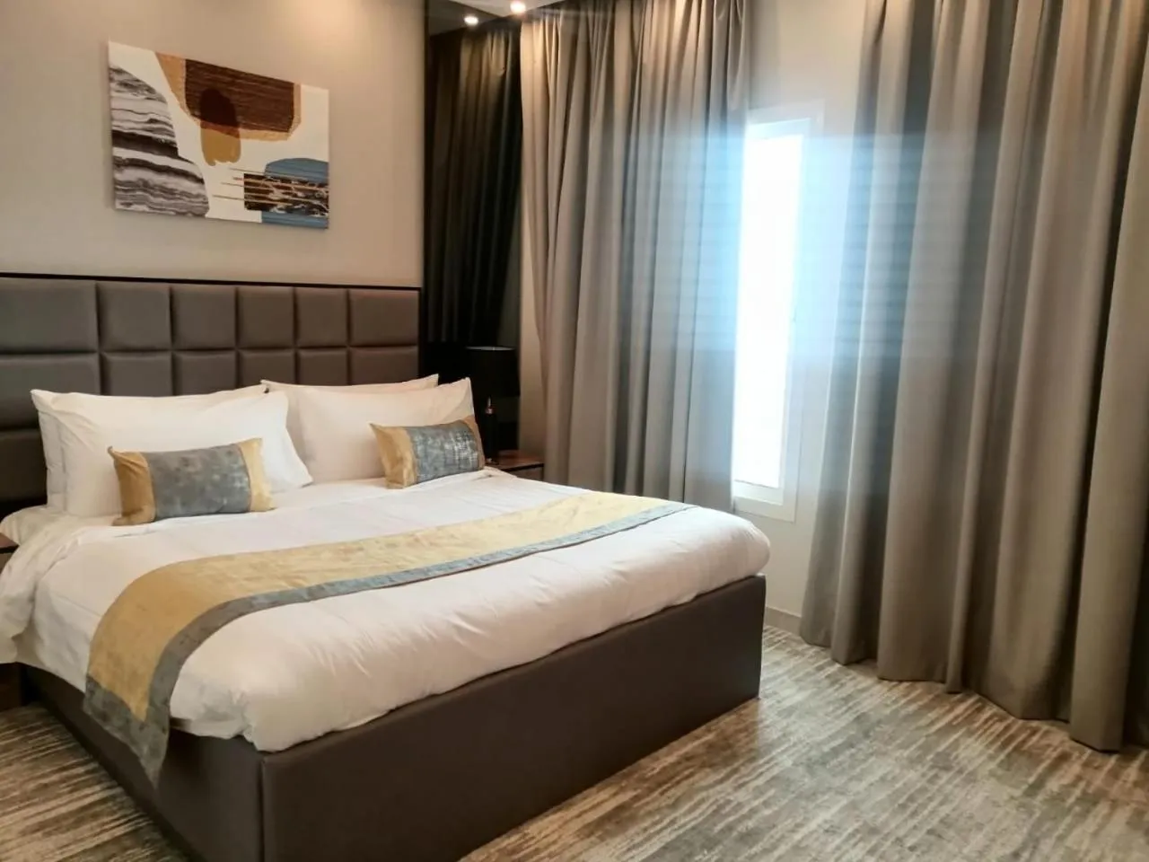 Bed in Clowzer Serviced Apartments