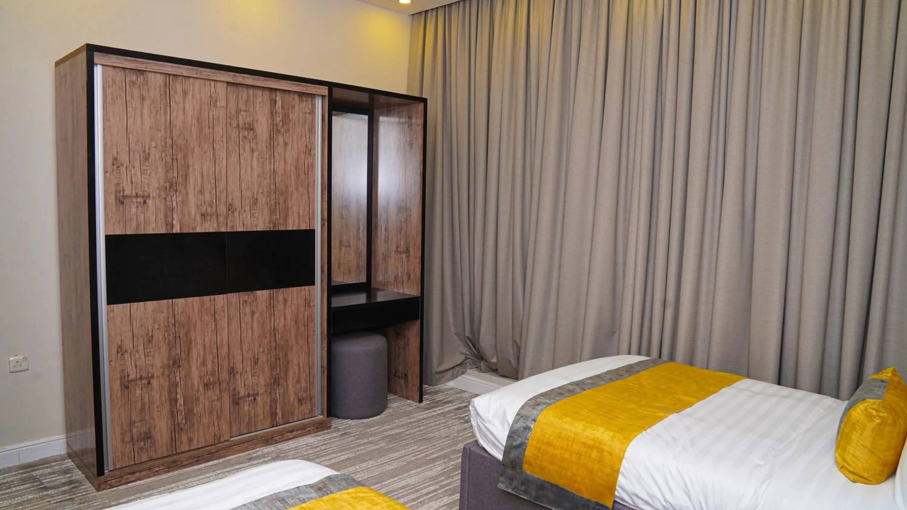 Bed in Clowzer Serviced Apartments