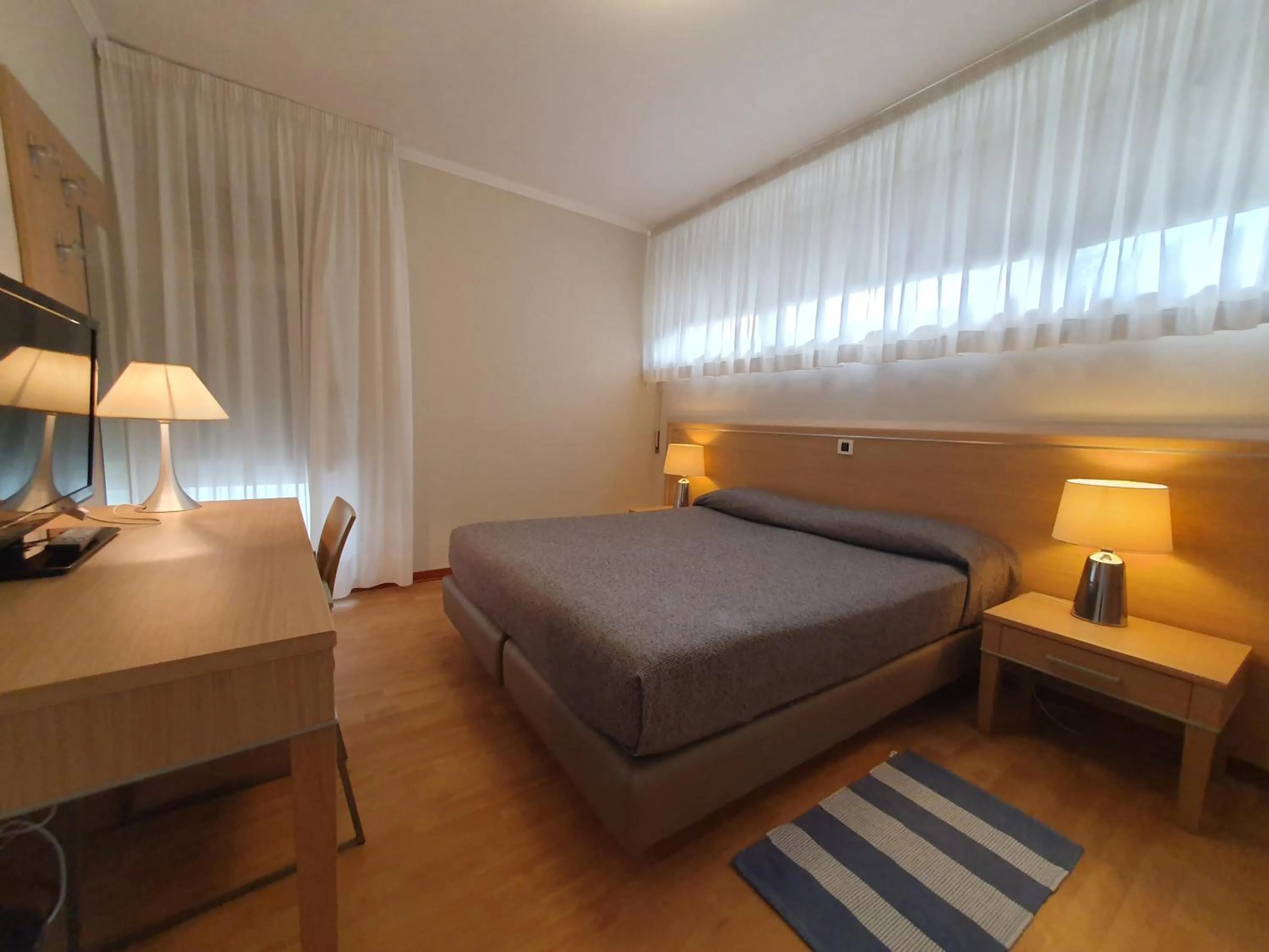 Bed in Hotel Eurovil Garni