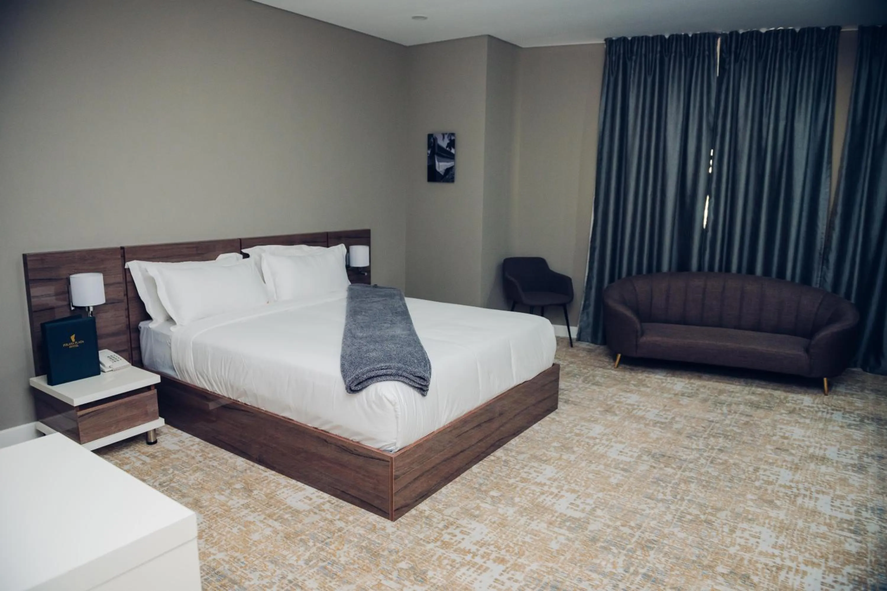 Bed in Polana Plaza Hotel