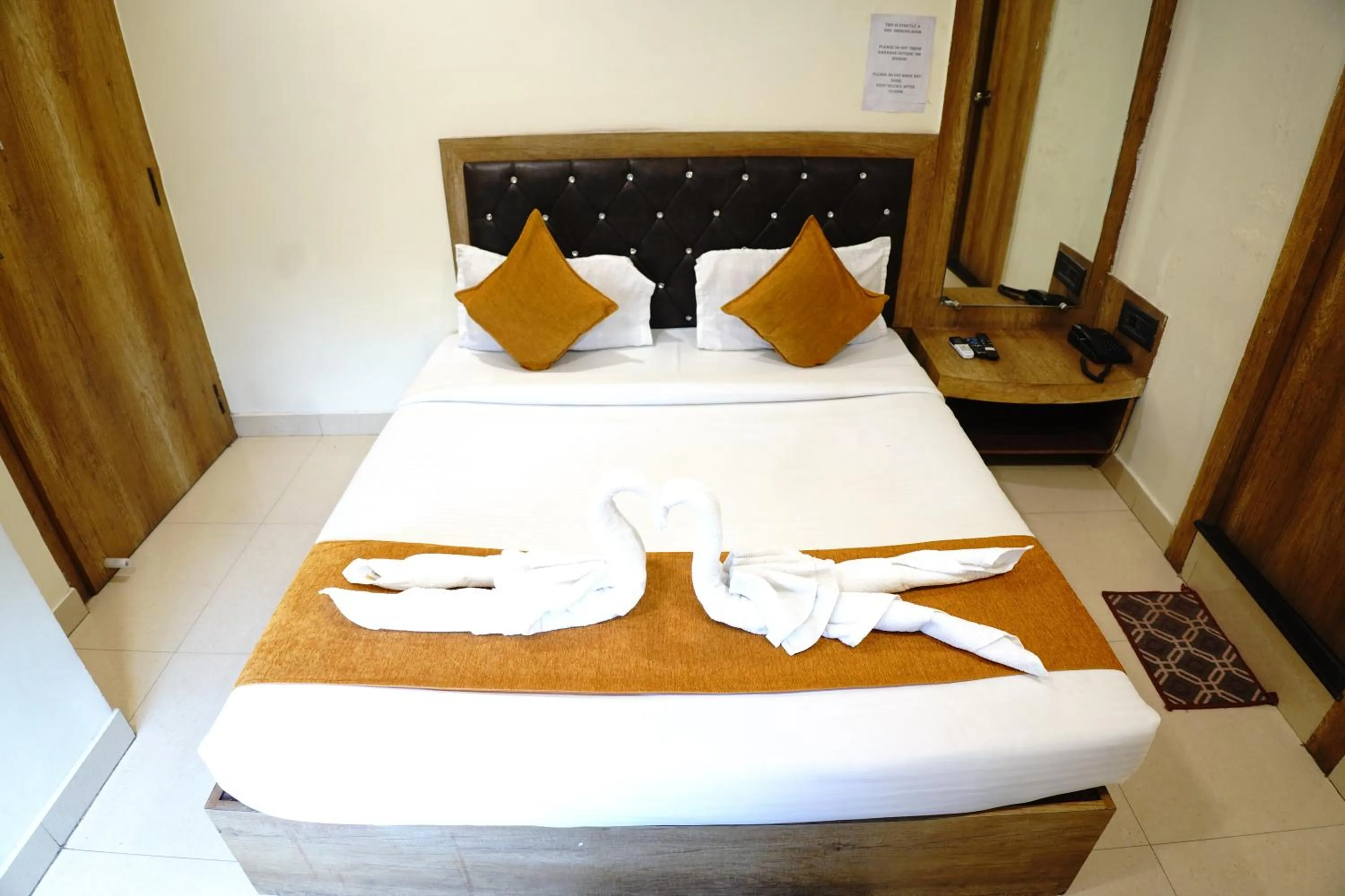 Bed in Hotel Grand Residency