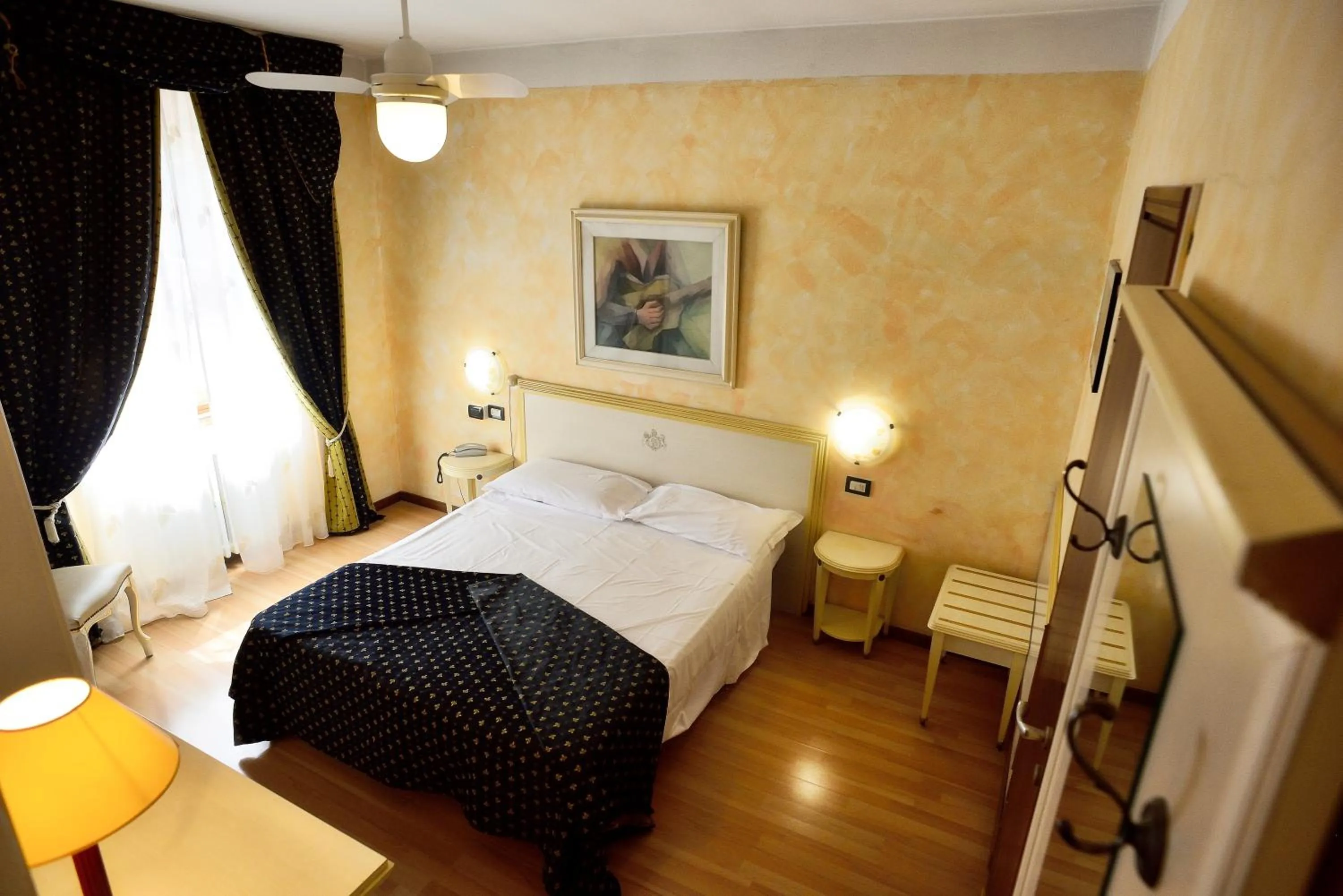 Bed in Hotel San Marino