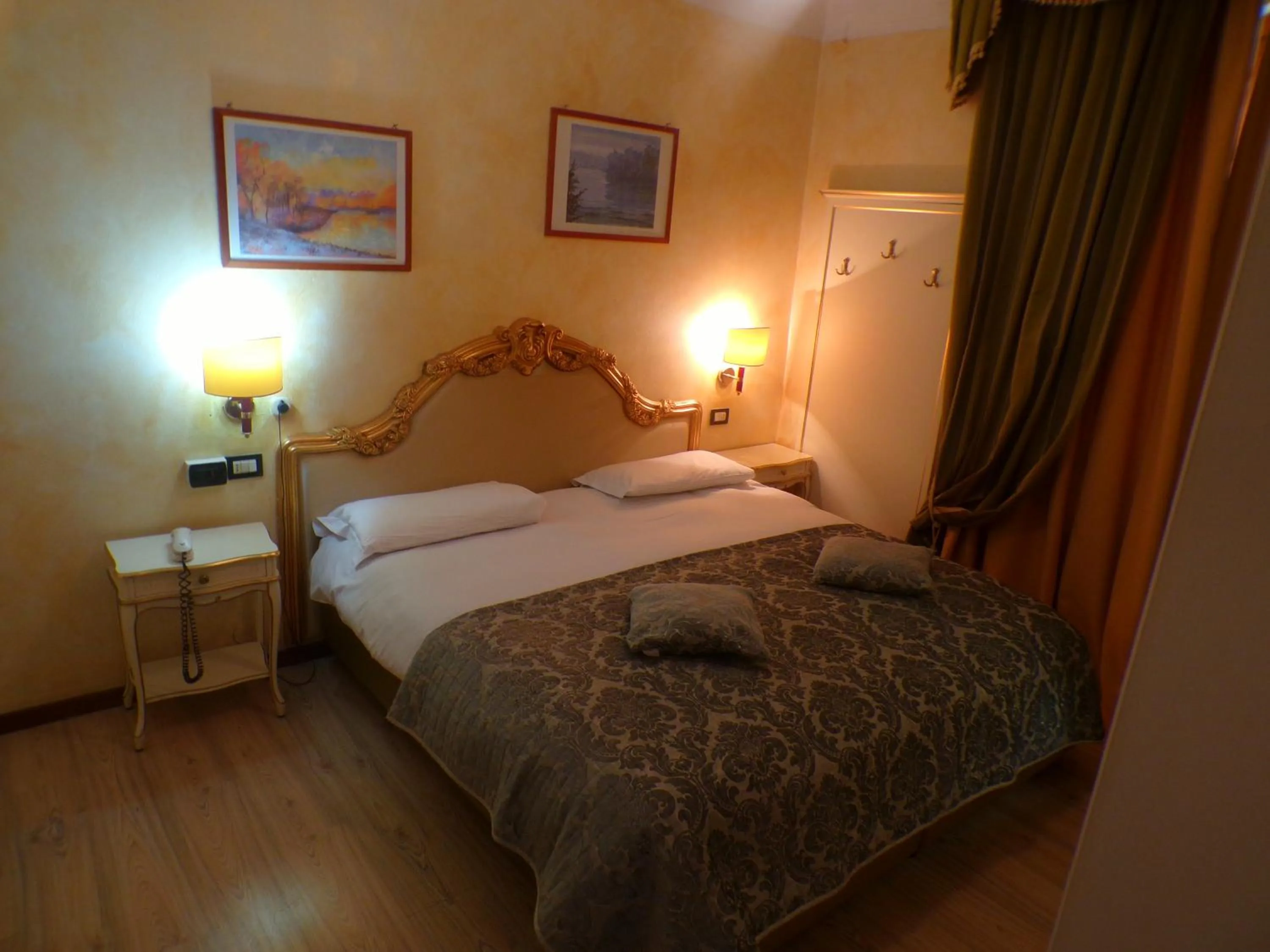 Bed in Hotel San Marino