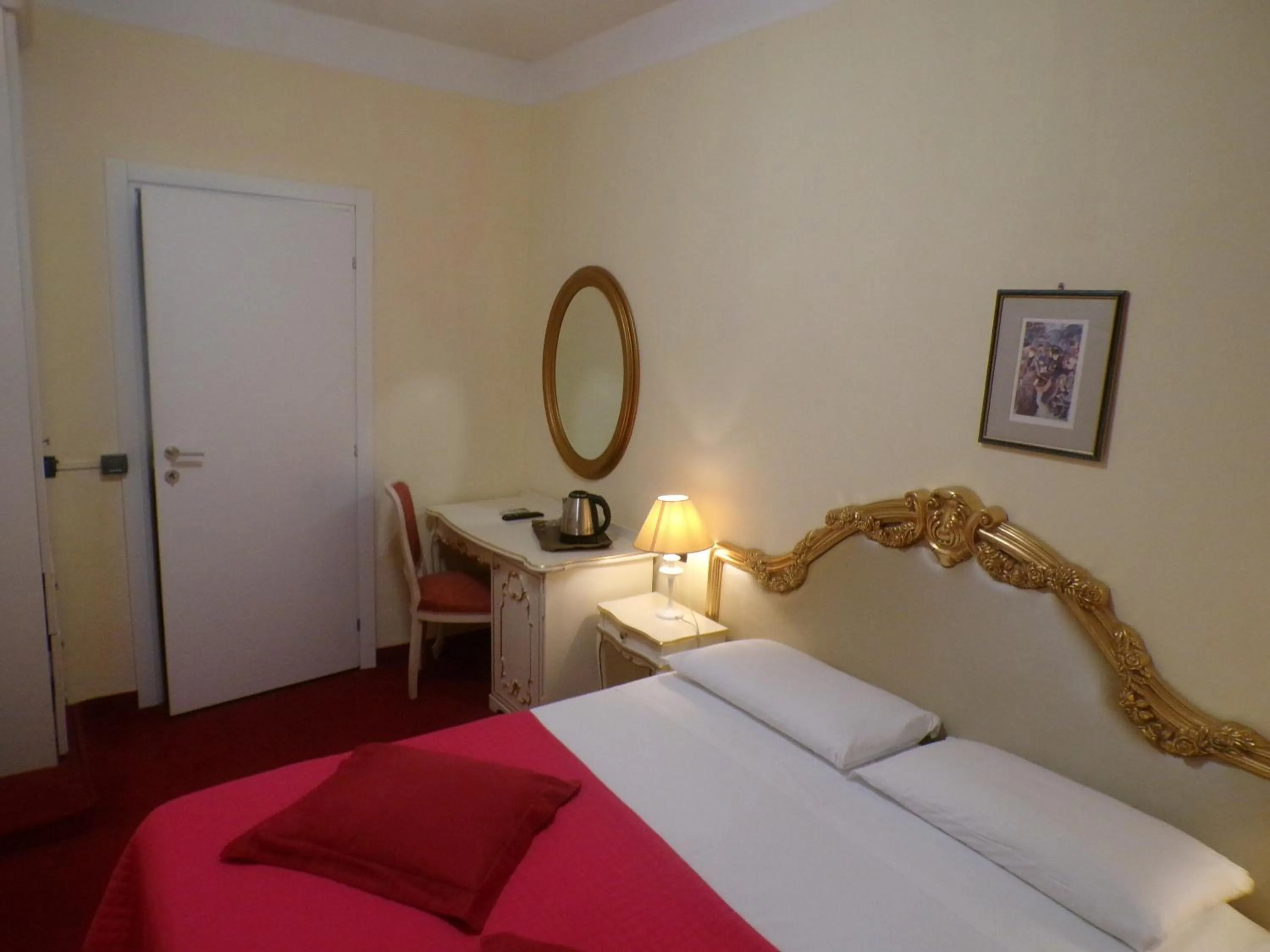 Bed in Hotel San Marino