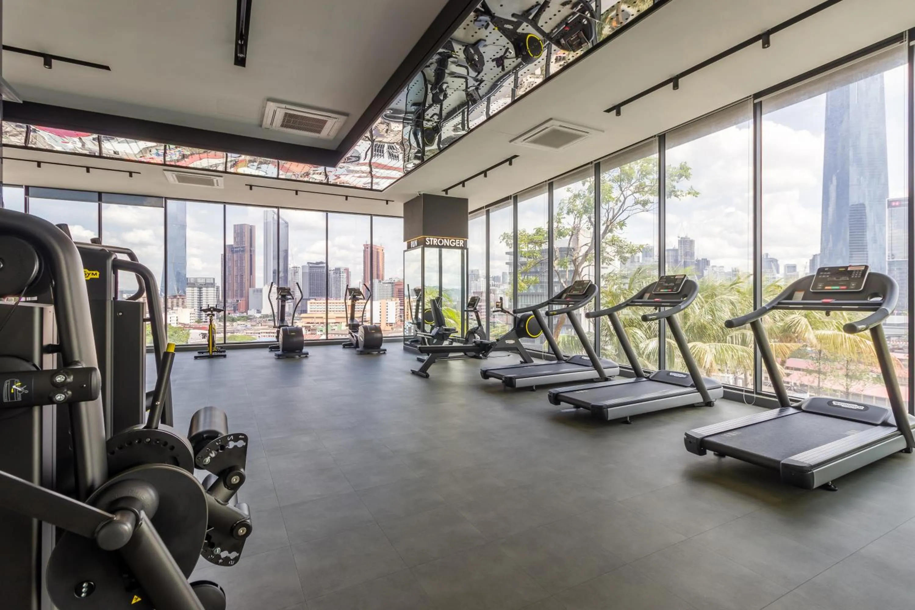 Fitness centre/facilities in Continew Residensi by Airhost