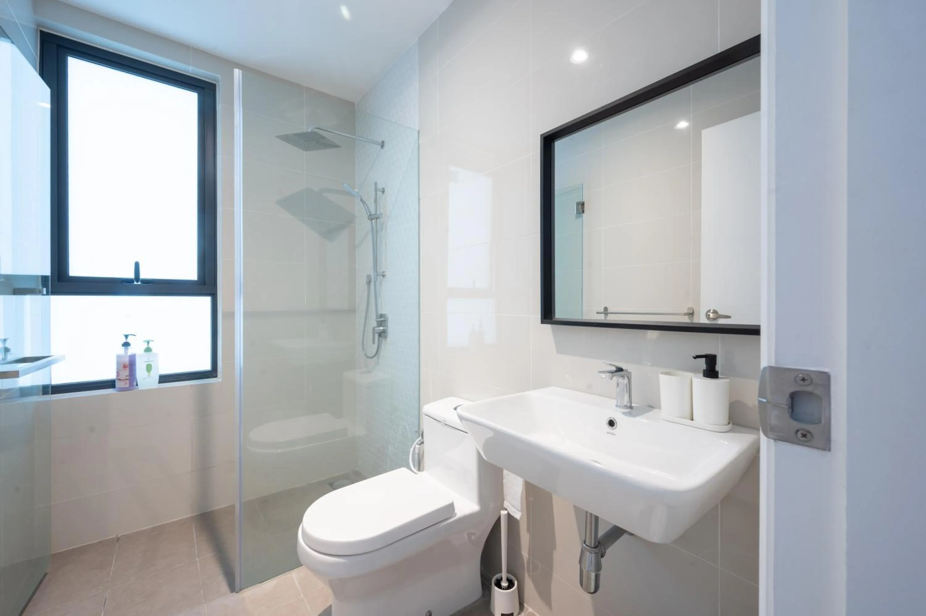 Bathroom in Continew Residensi by Airhost