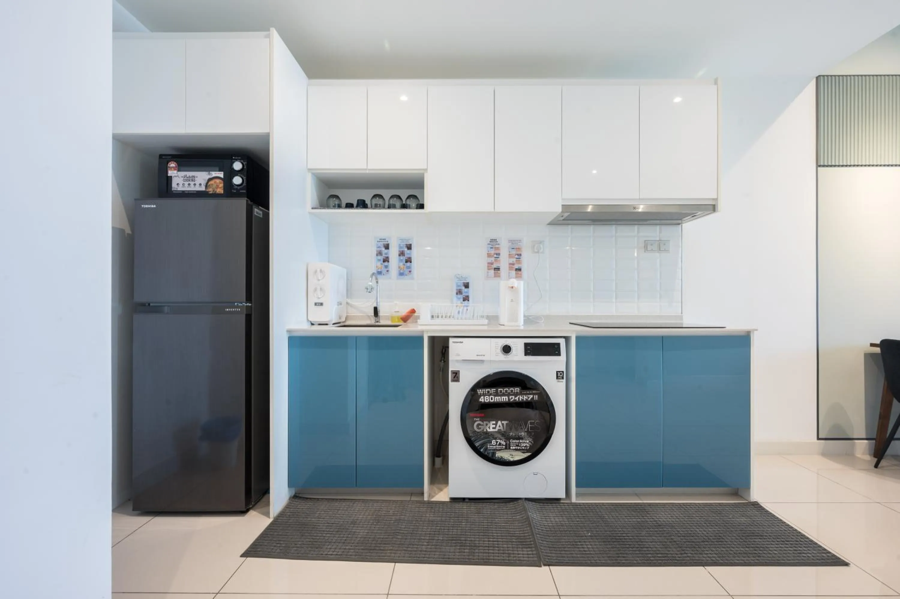 kitchen in Continew Residensi by Airhost