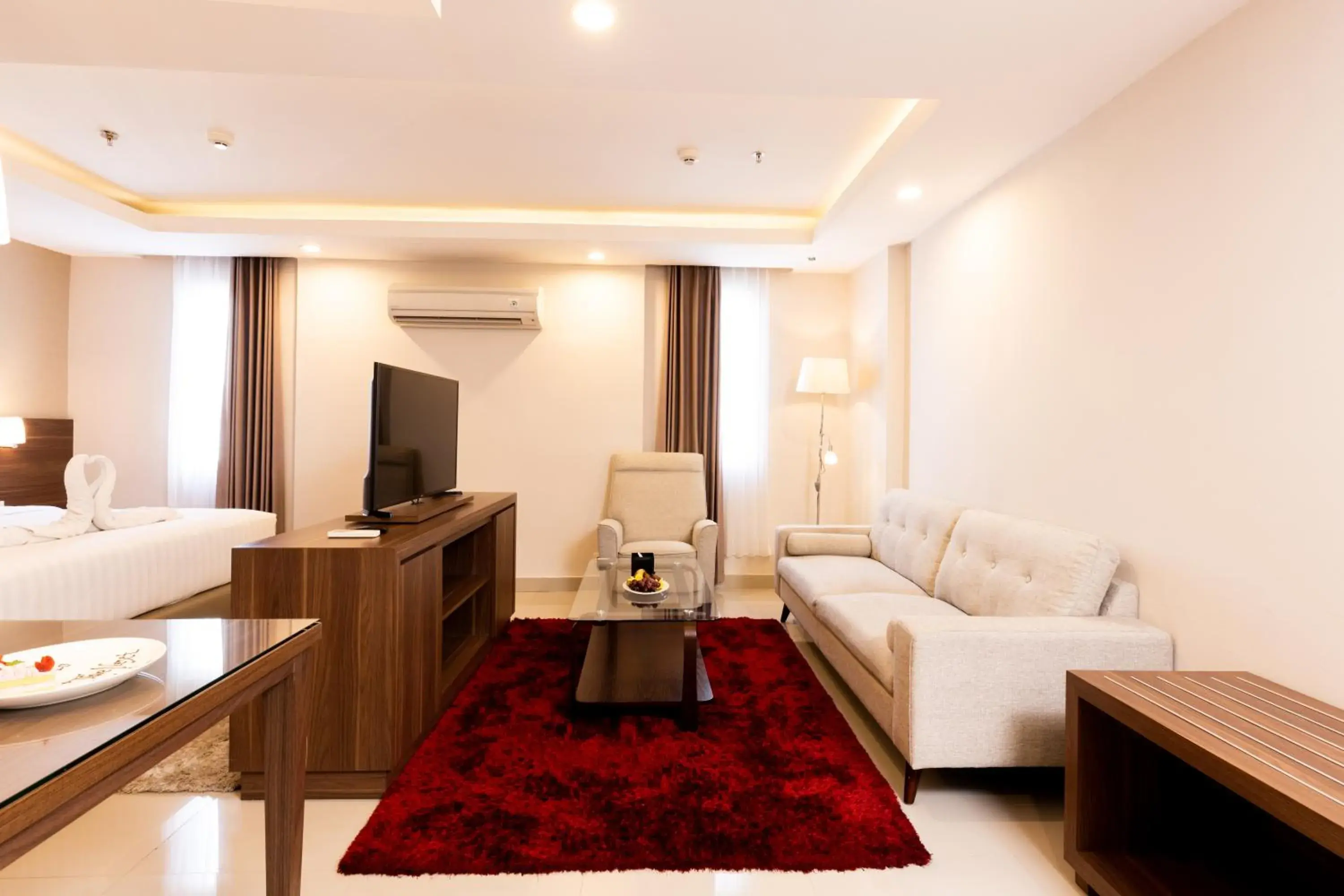 TV and multimedia, Bed in Next Hotel Yogyakarta TV and multimedia, Bed in Next Hotel Yogyakarta