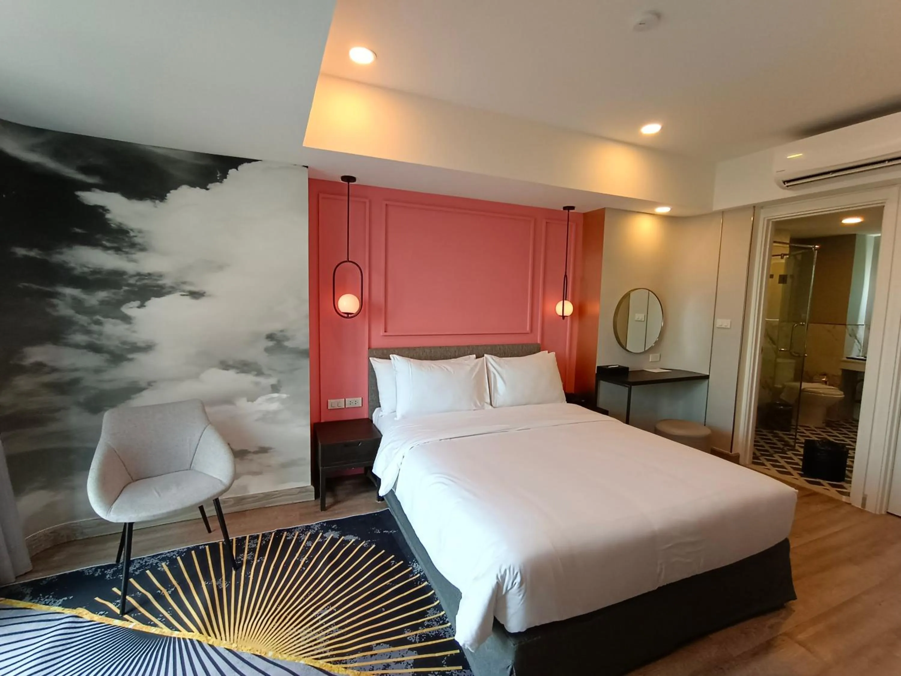 Bed in VIVA LA VIDA HOTEL