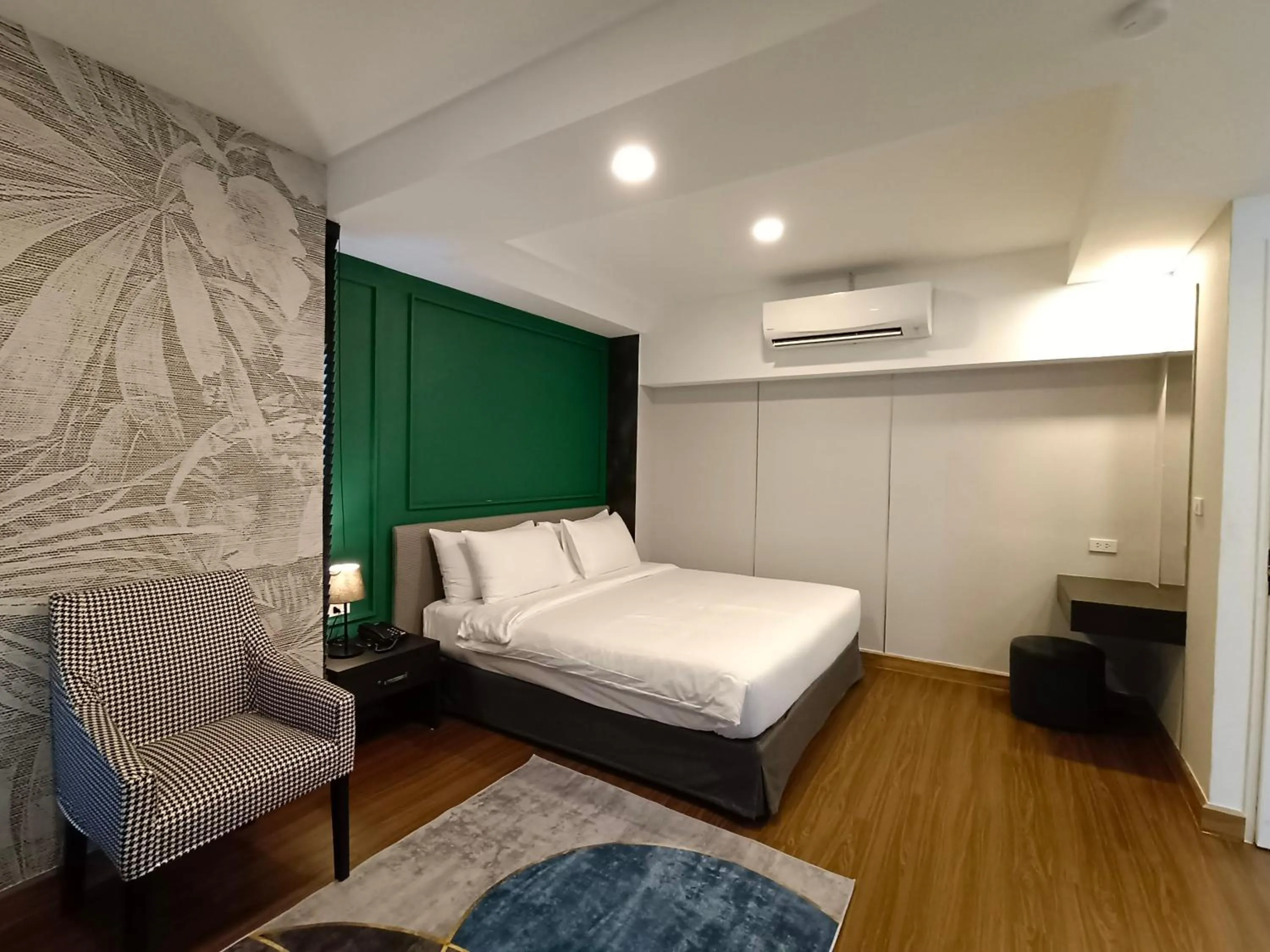 Bed in VIVA LA VIDA HOTEL