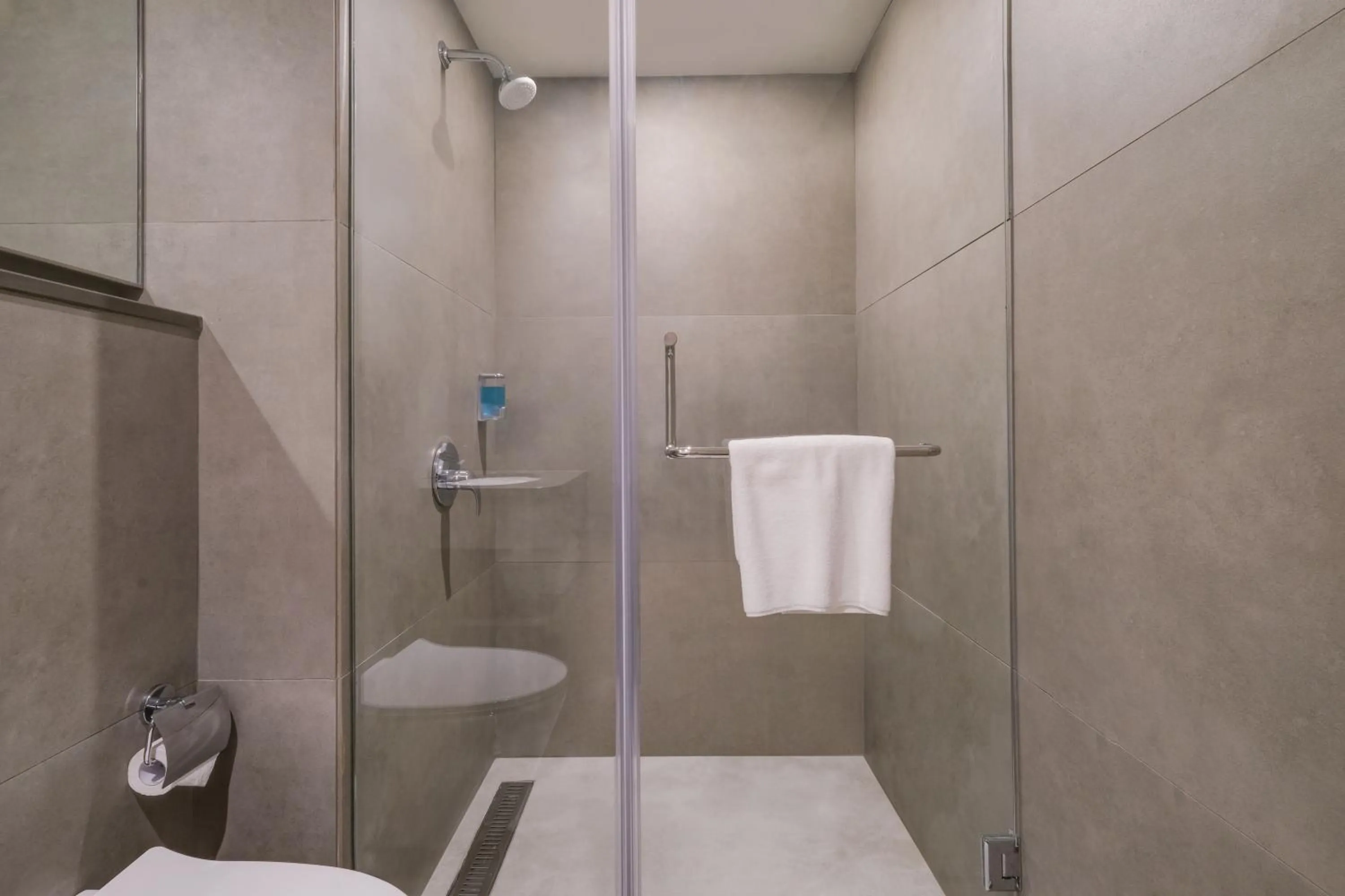 Shower in 7 Apple Hotel Mahape, Navi Mumbai