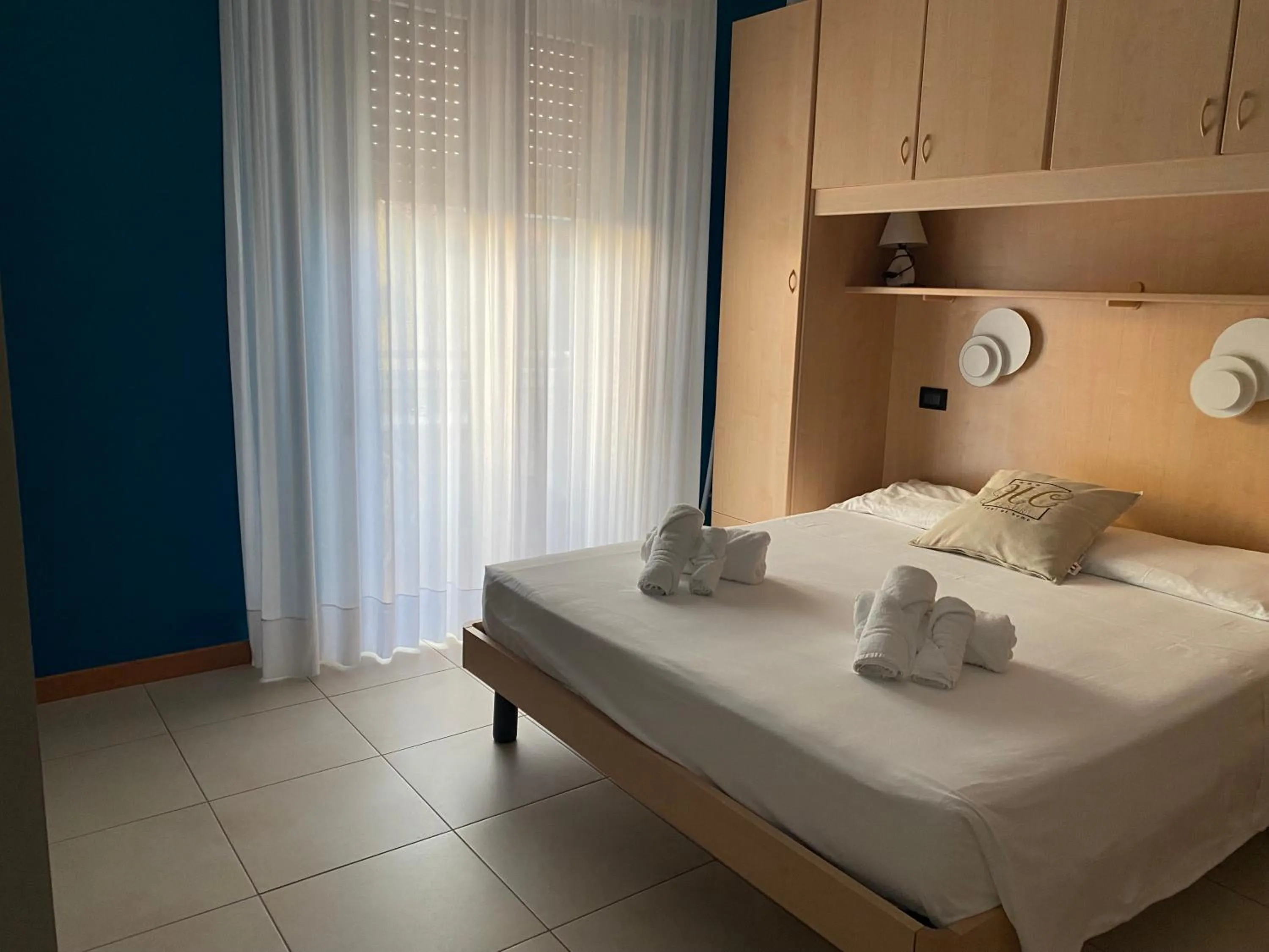 Bedroom, Bed in Hotel Hc Resort Lignano