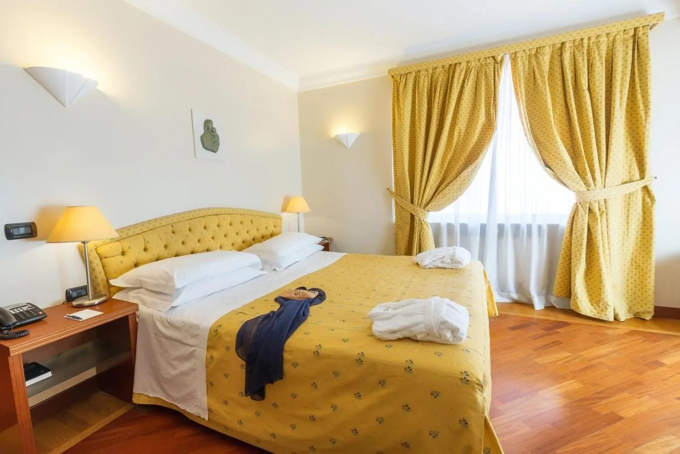 Photo of the whole room, Bed in Hotel Nettuno