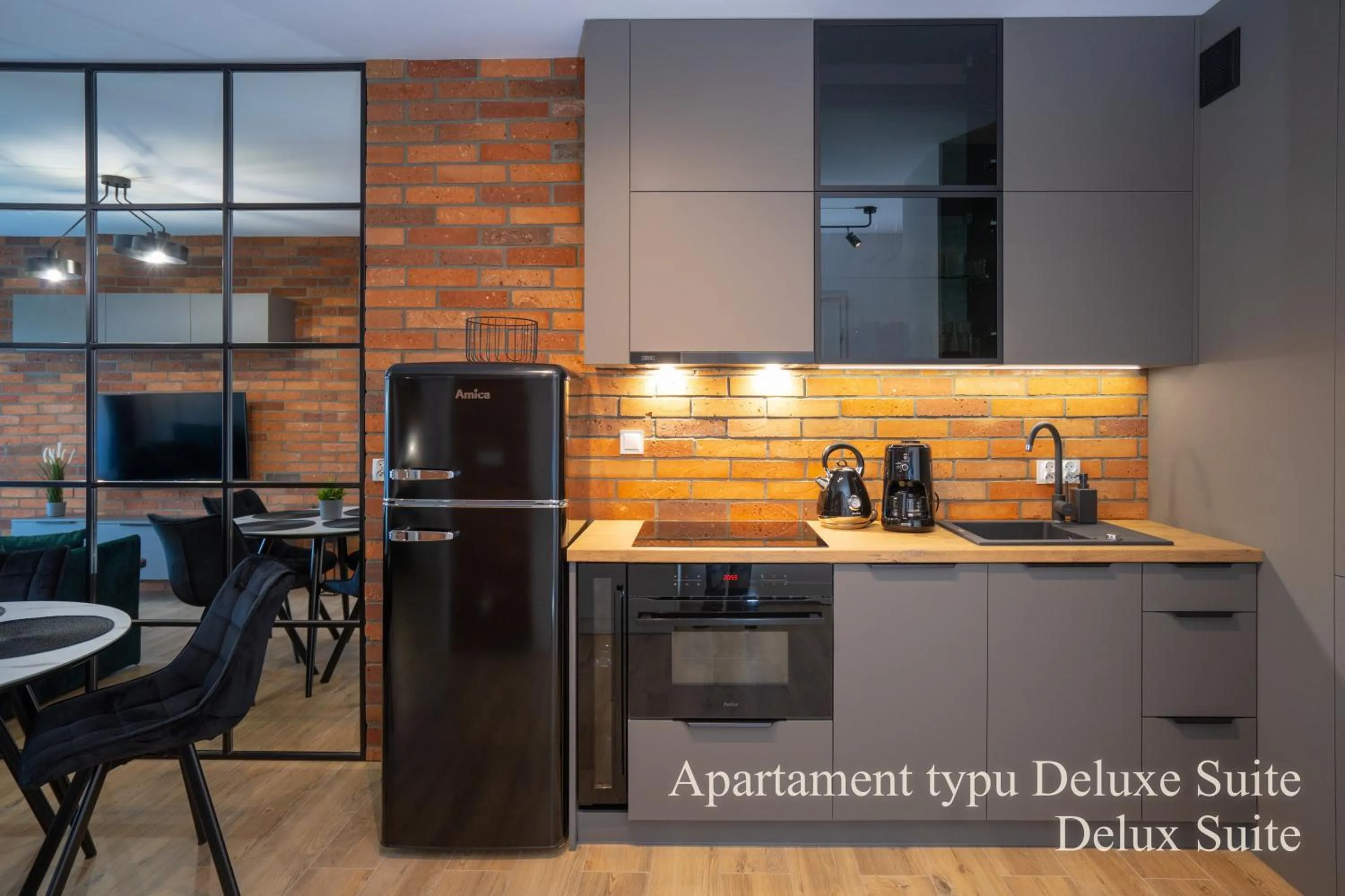 Kitchen or kitchenette in RentPlanet - Apartamenty IzerSKI Resort