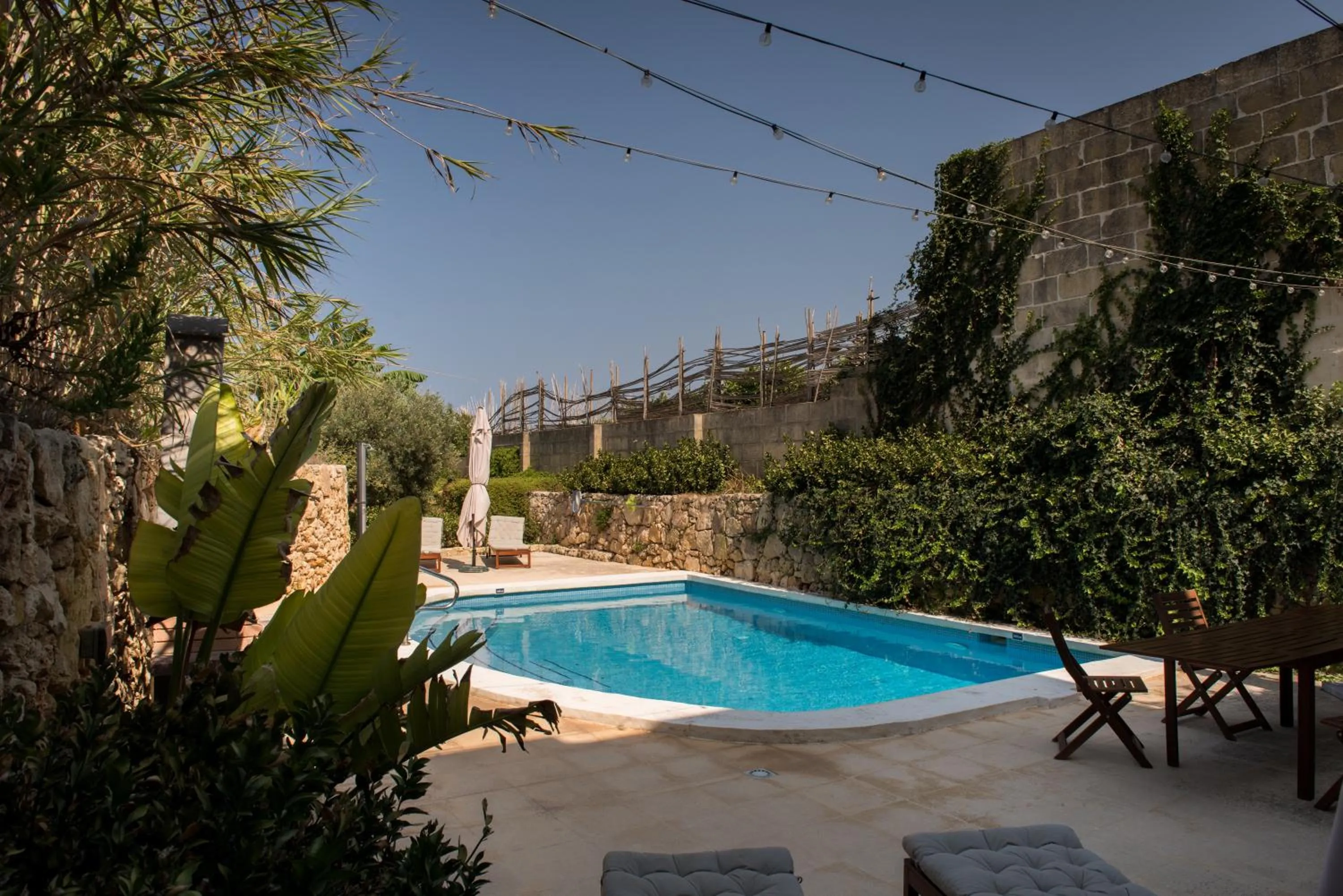 Swimming pool in Farmhouse Razzett Cora